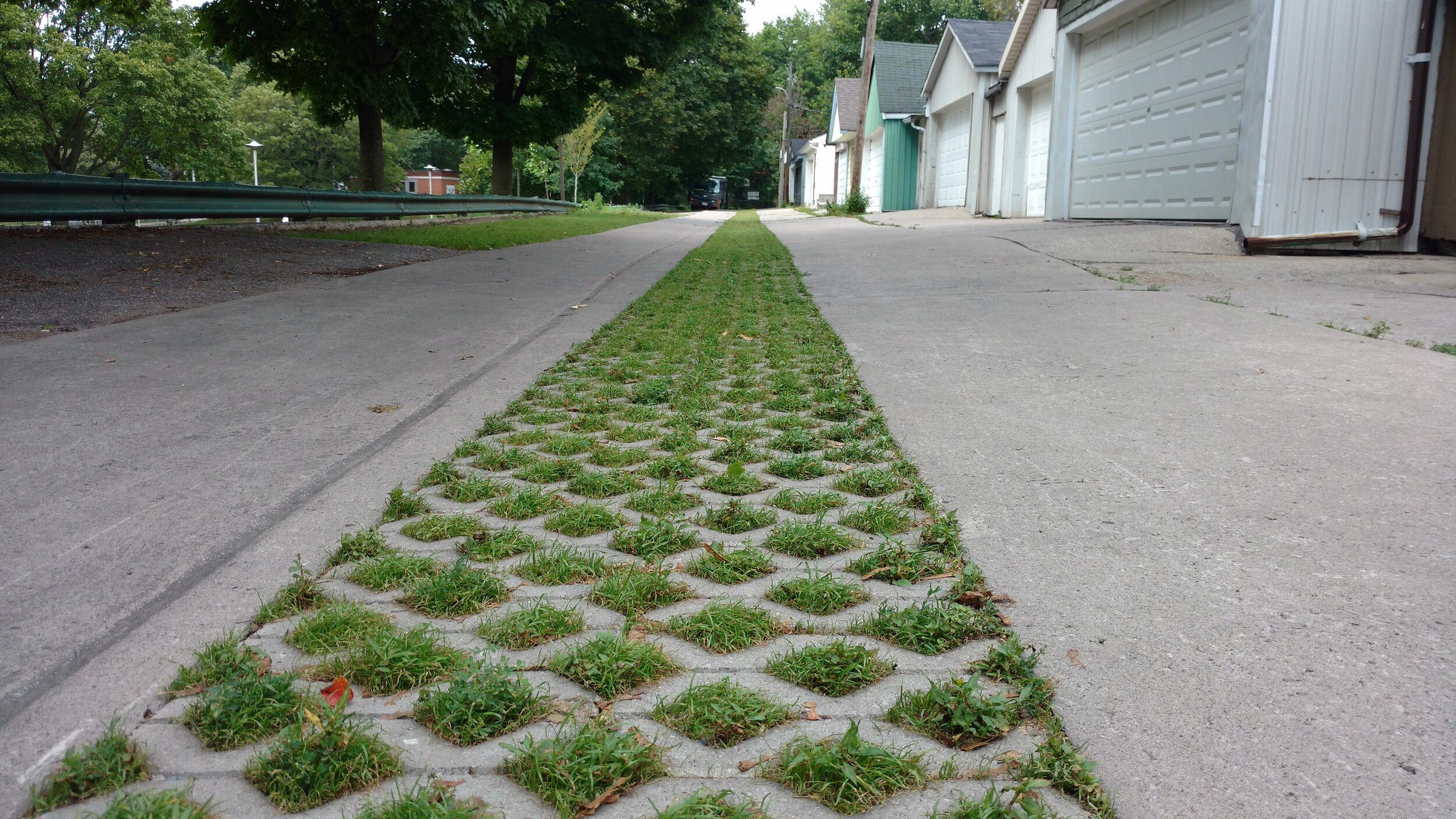  Open-celled pavers strike a balance between pavement structure and permeability.  &nbsp;Location:&nbsp; Fred Hamilton Lane, Toronto  Image credit: Michelle Senayah, the Laneway Project  