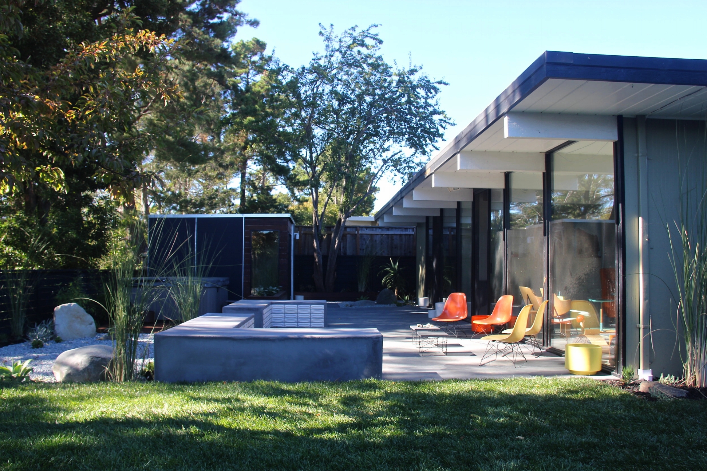Yorktown main patio looking toward shed needs Perlson and logo.jpeg
