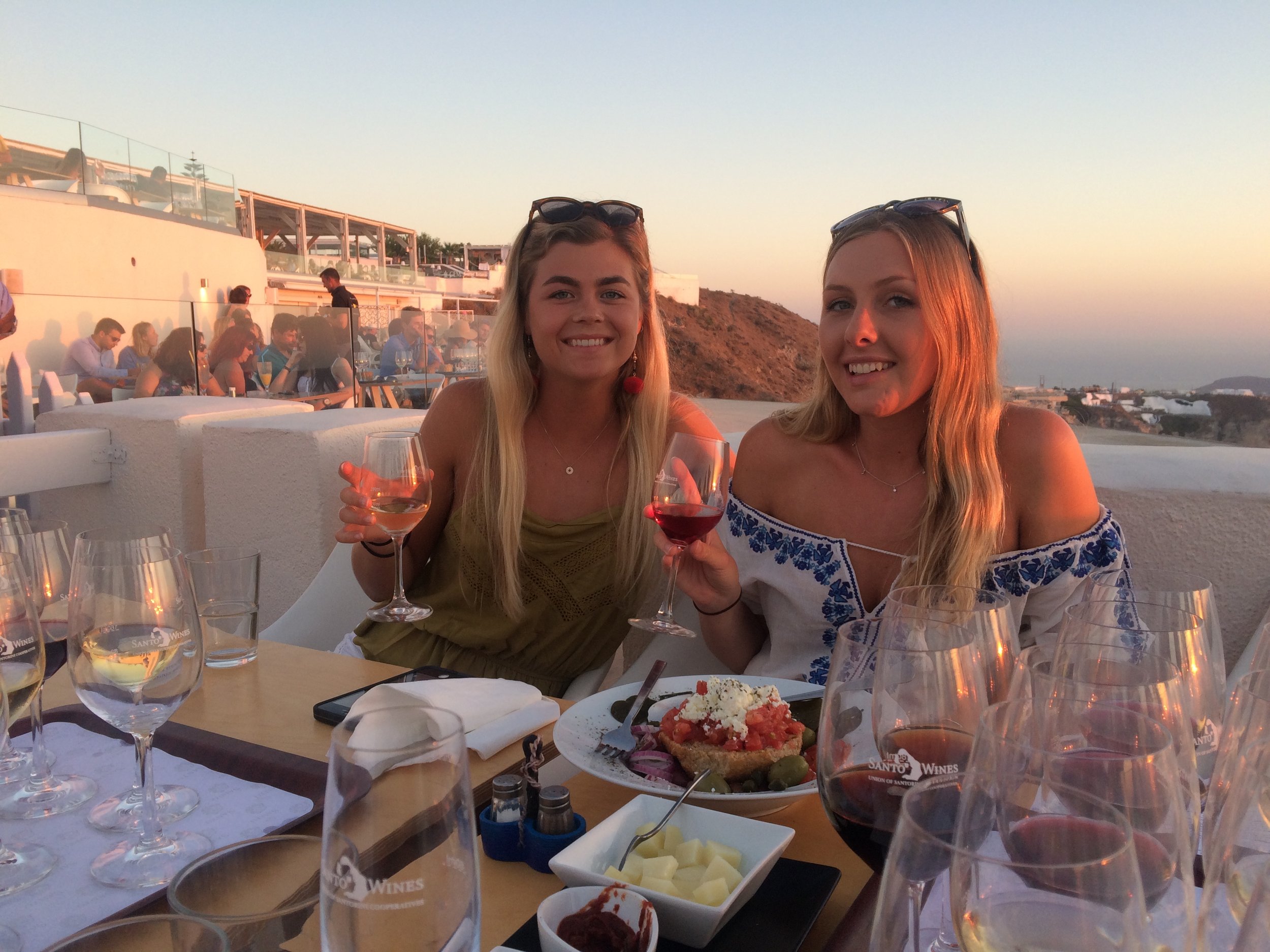 Sunset and wine tasting at 'Santo Wines,' in Santorini, Greece. 