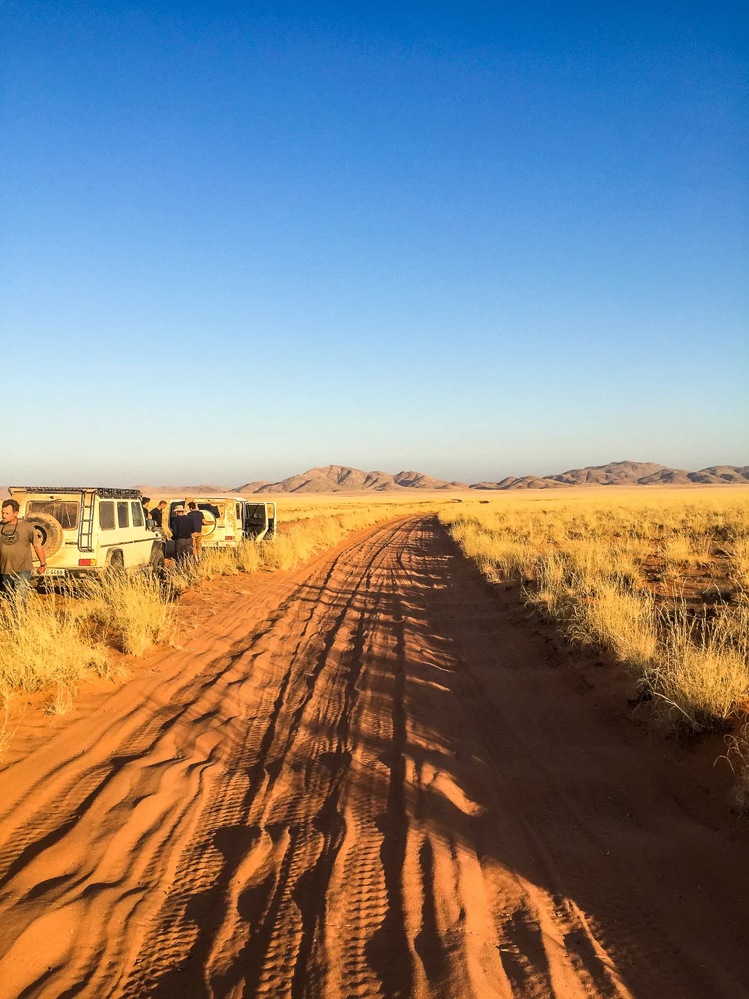 Taking advantage of twilight to appreciate the colours of Namibia. Somewhere east of the Skeleton Coast. June, 2016.