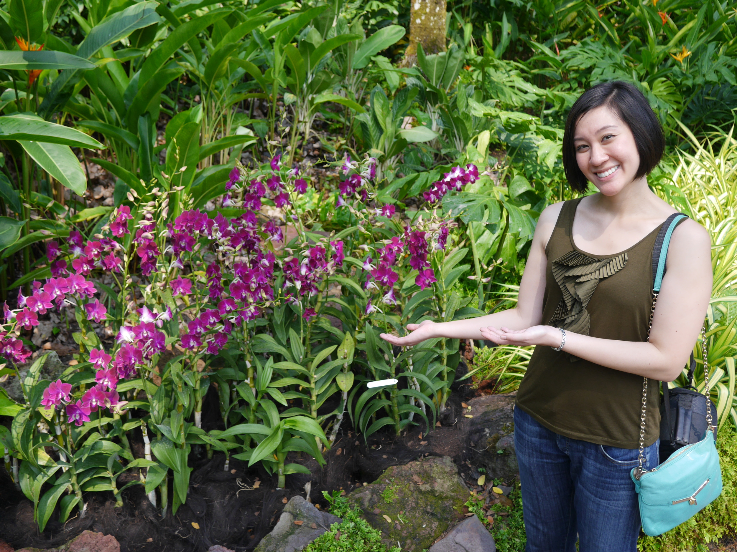  Grace showing off some orchids. 
