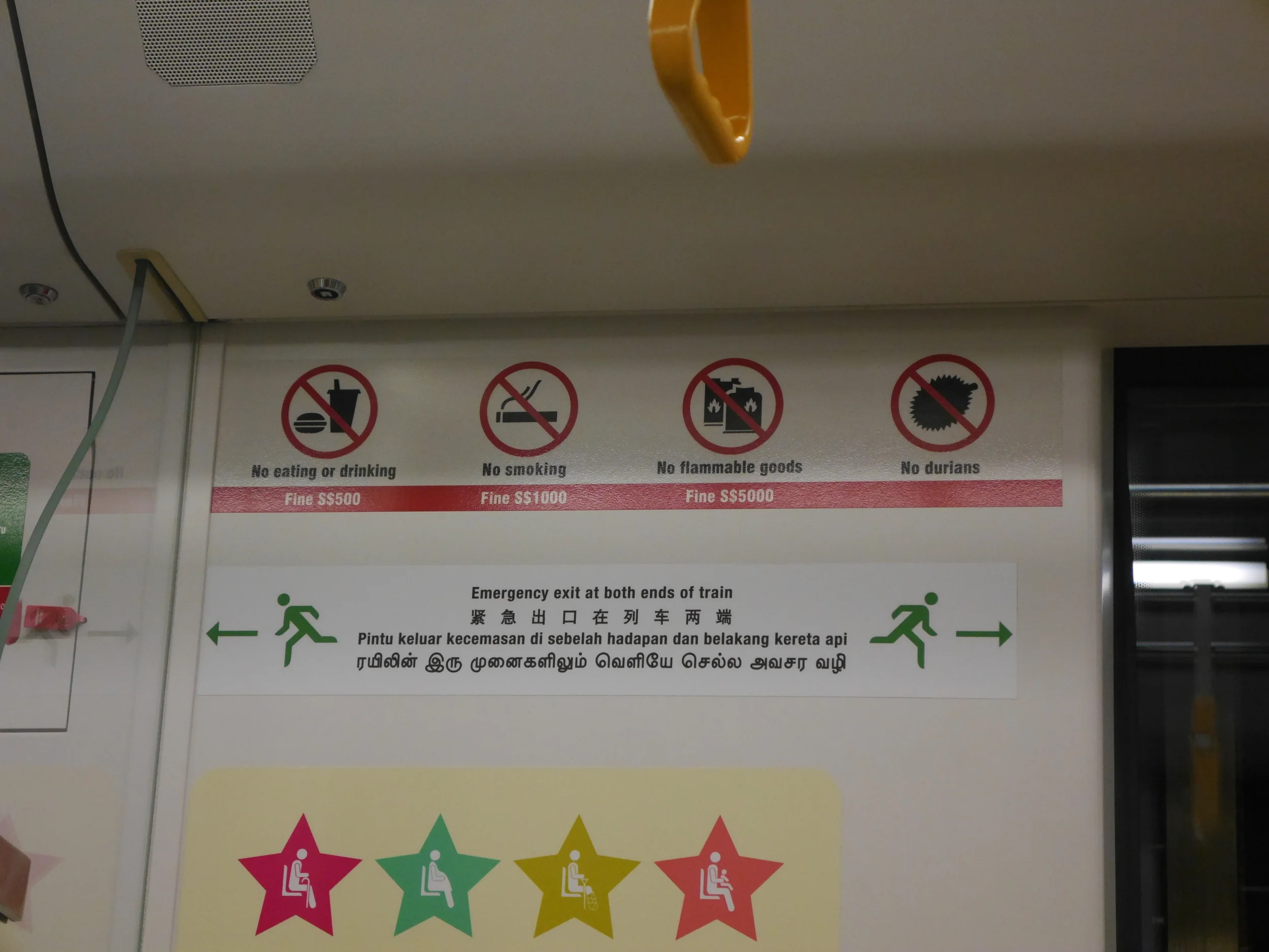 Okay, first I took this picture because "No durians." Only afterwards did I notice that, while durians are not permitted, their possession apparently carries no fine, unlike the other items. Also you can see the clearly denoted reserved seat for the elderly, pregnant, injured, or parent of small children. Or, presumably, any combination thereof.