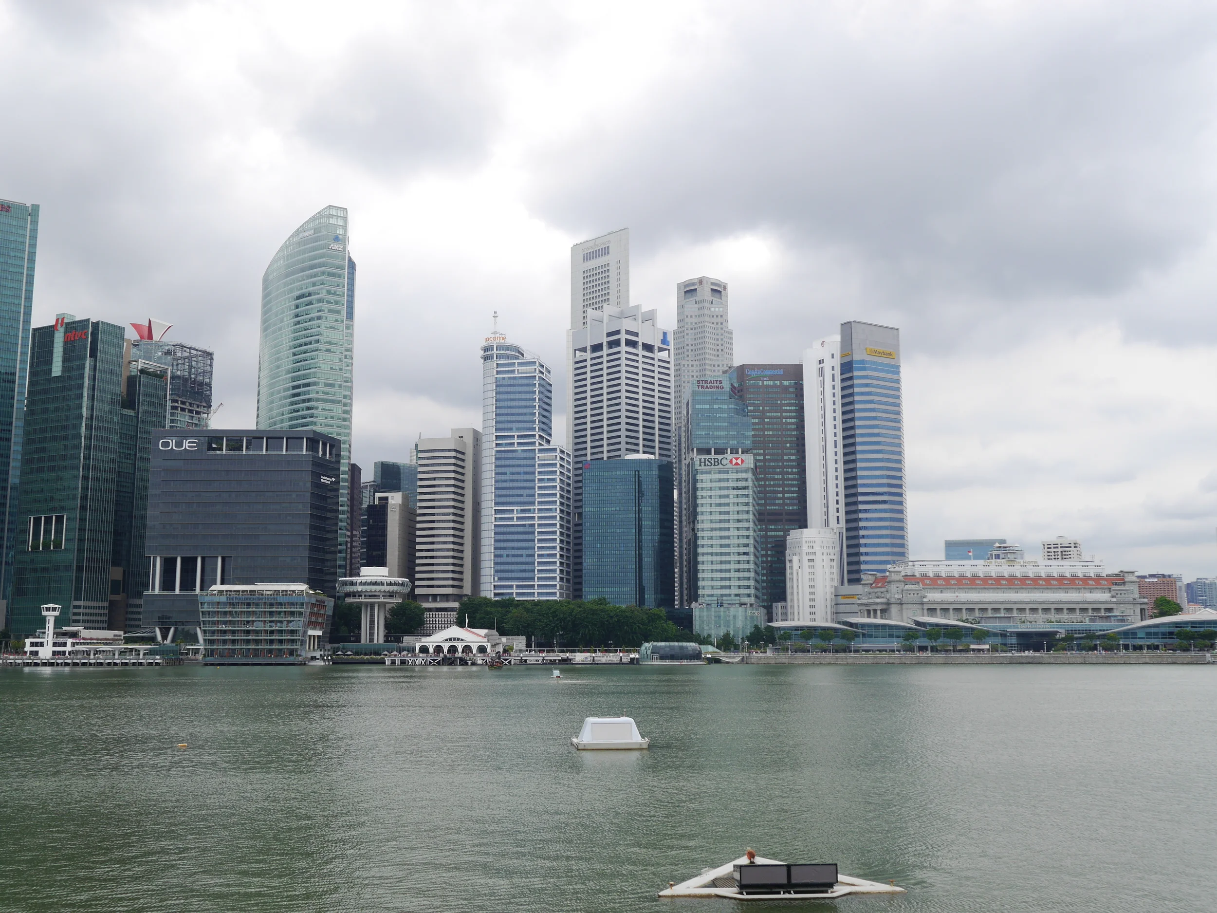  More of the Singapore skyline, including the Fullerton Hotel on the right by the water. Also some strange, air control tower-looking buildings on the left. 