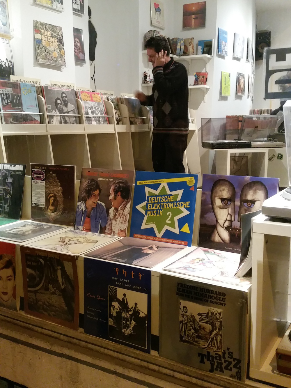  Some guy browsing vinyl in a little store we passed. 