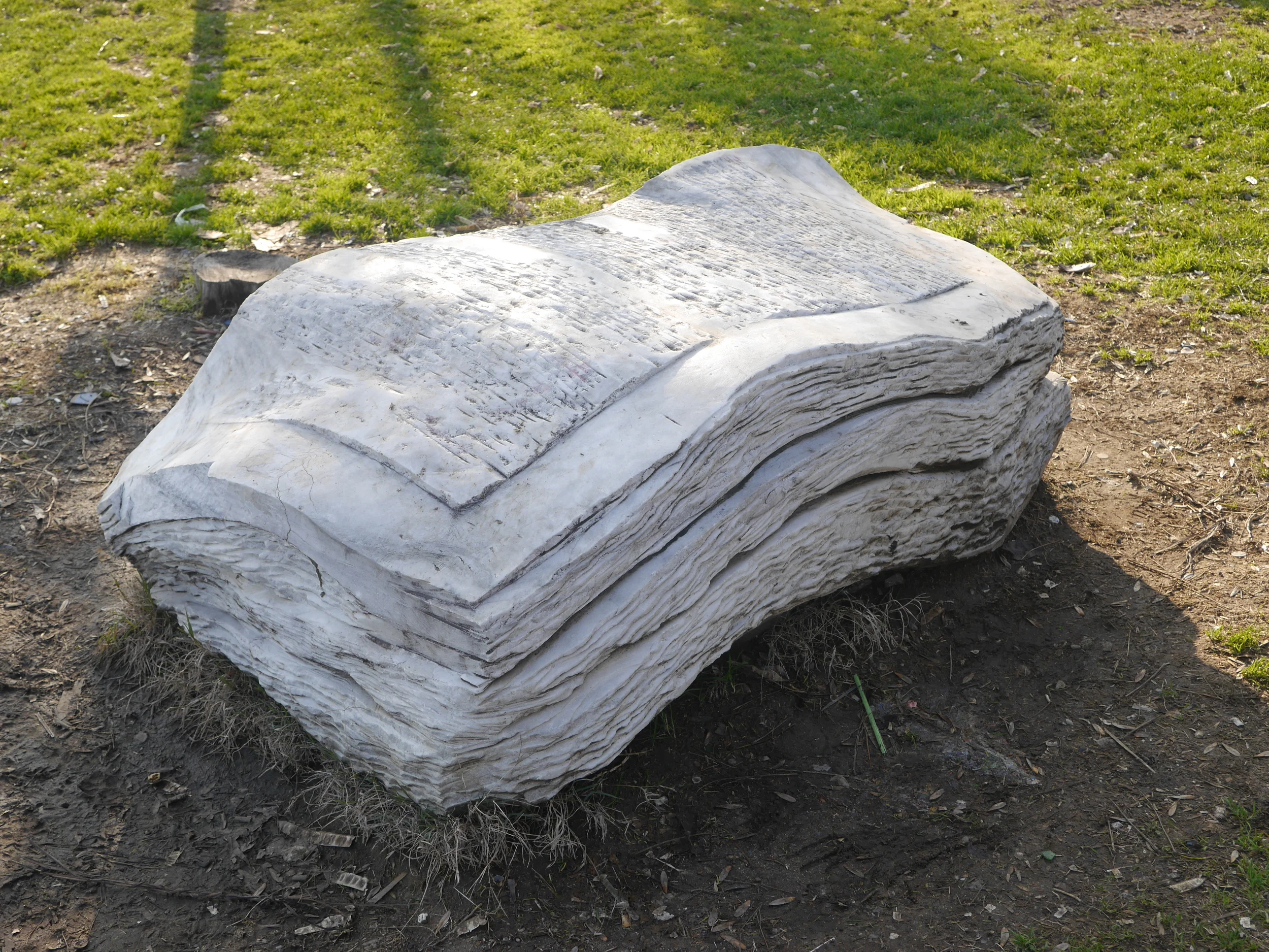  Marble sculpture of a book of some sort. 