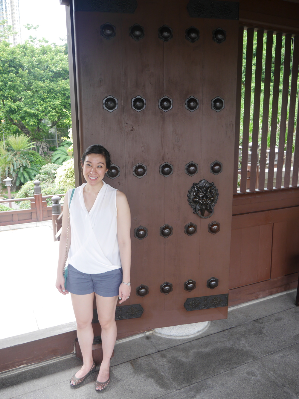  Grace posing next to one of the doors. I wish all my doors had massive, intricate dragon-head handles. 