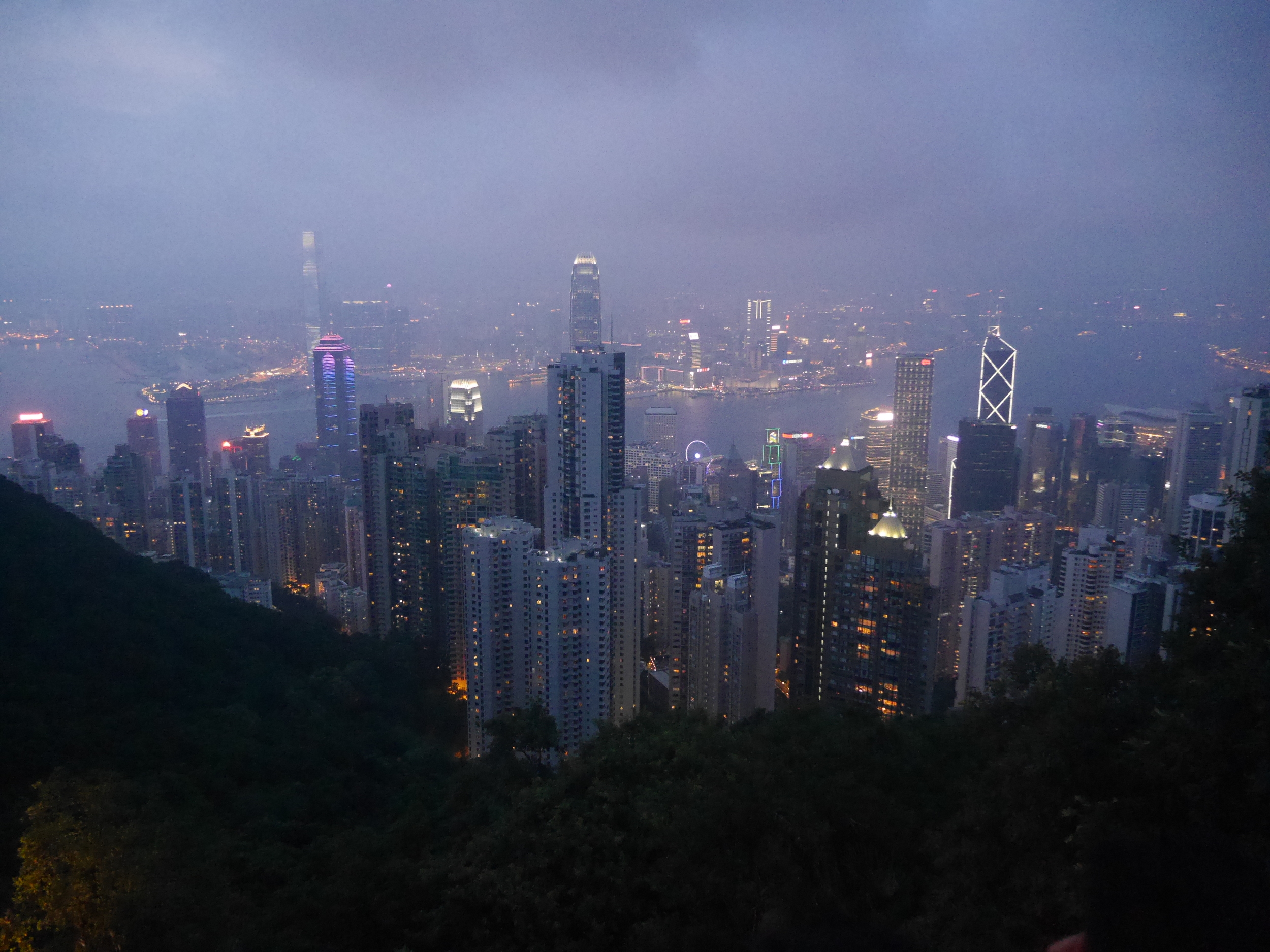  The Hong Kong skyline at night. Hong Kong Island in the foreground, Kowloon in the background. 