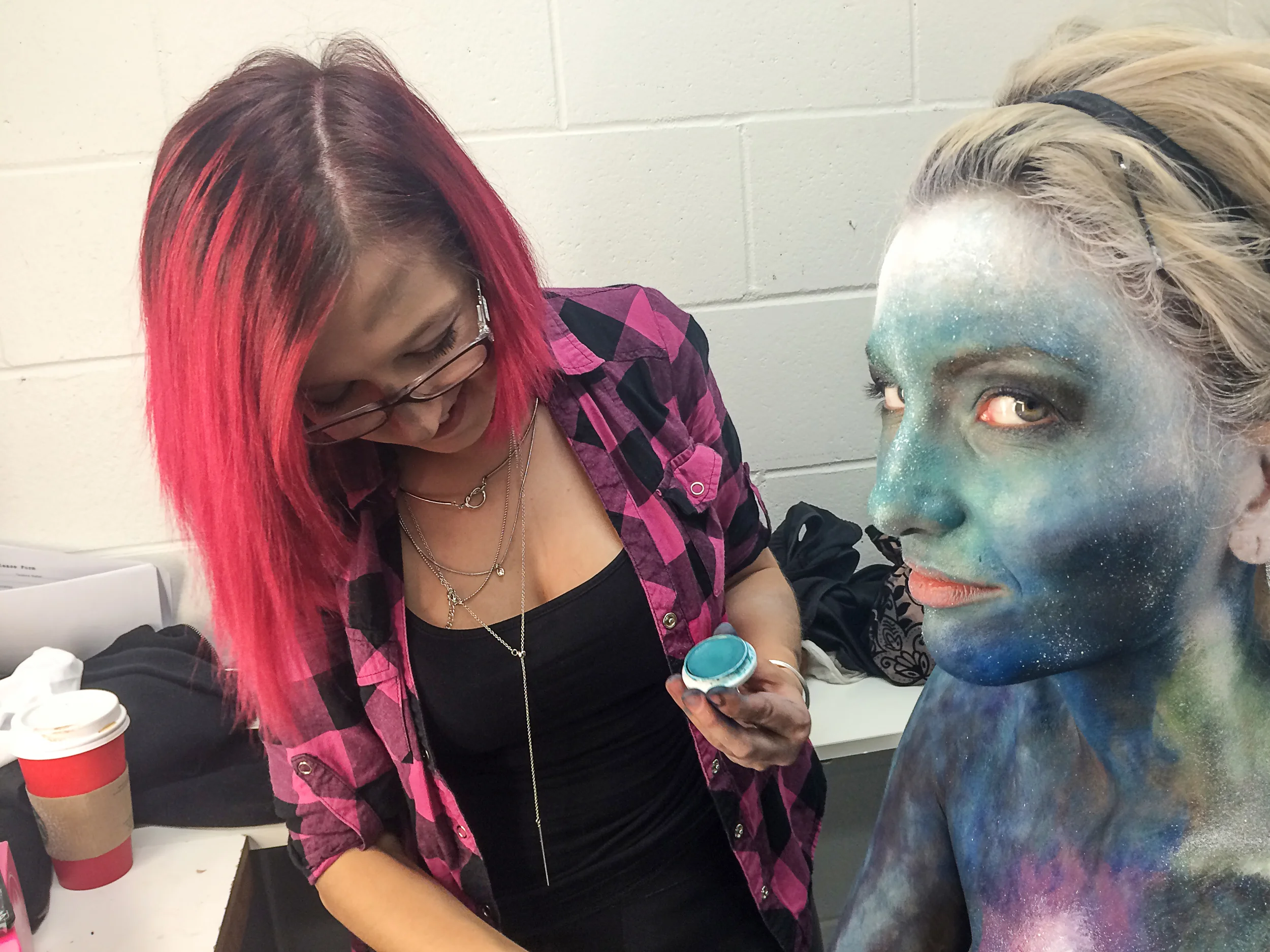 Tora the MUA working on a galaxy bodypaint