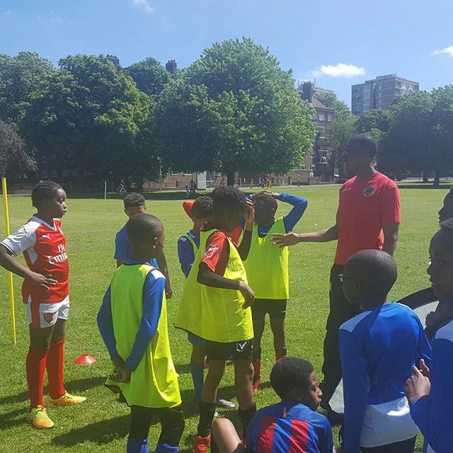 Coaches explaining drills during training. ALL that boys listening and taking on board the information. 10.06.17