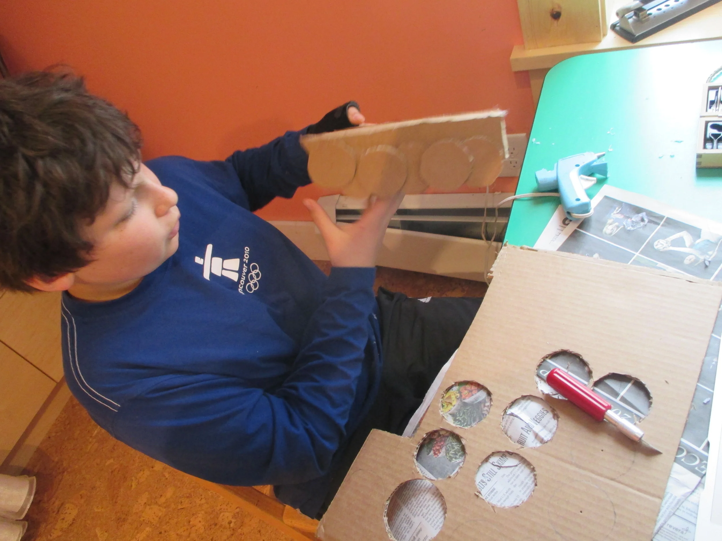 COle works on his WWII tank during Journey. He researched the tanks, wrote about them, and then decided to build a model. Ask him about them!