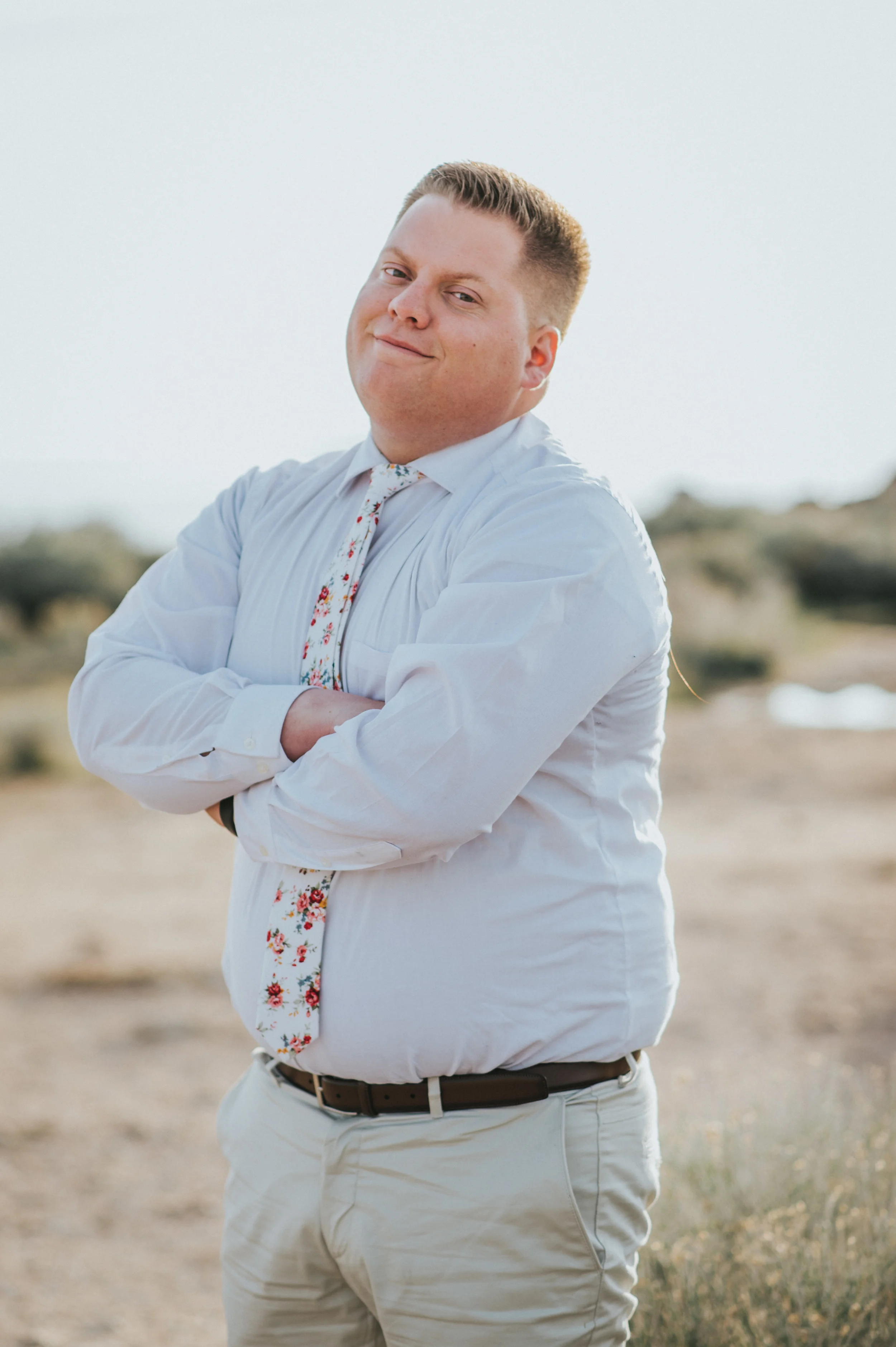  engagement session soon to be groom attire inspiration floral tie wedding tie antelope island engagement session groom pose inspiration engagement session inspiration ideas and goals #engagement #antelopeisland #utah #love #soontobehusbandandwife #c