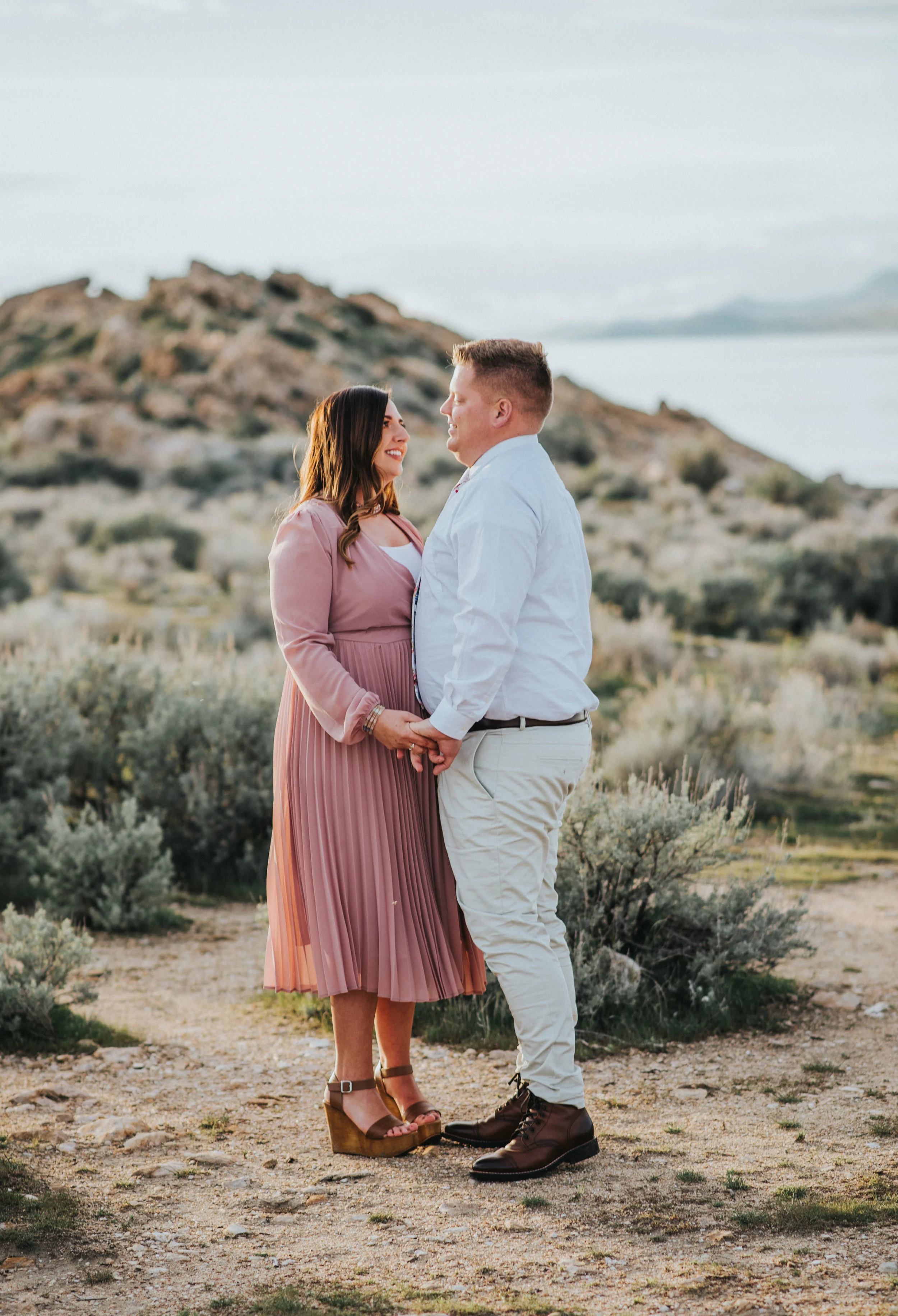  looking into each others eyes couple pose inspiration beautiful photo shoot location inspiration warm soft lighting beautiful photo shoot session utah photographer beautiful bride #engagement #antelopeisland #utah #love #soontobehusbandandwife #coup