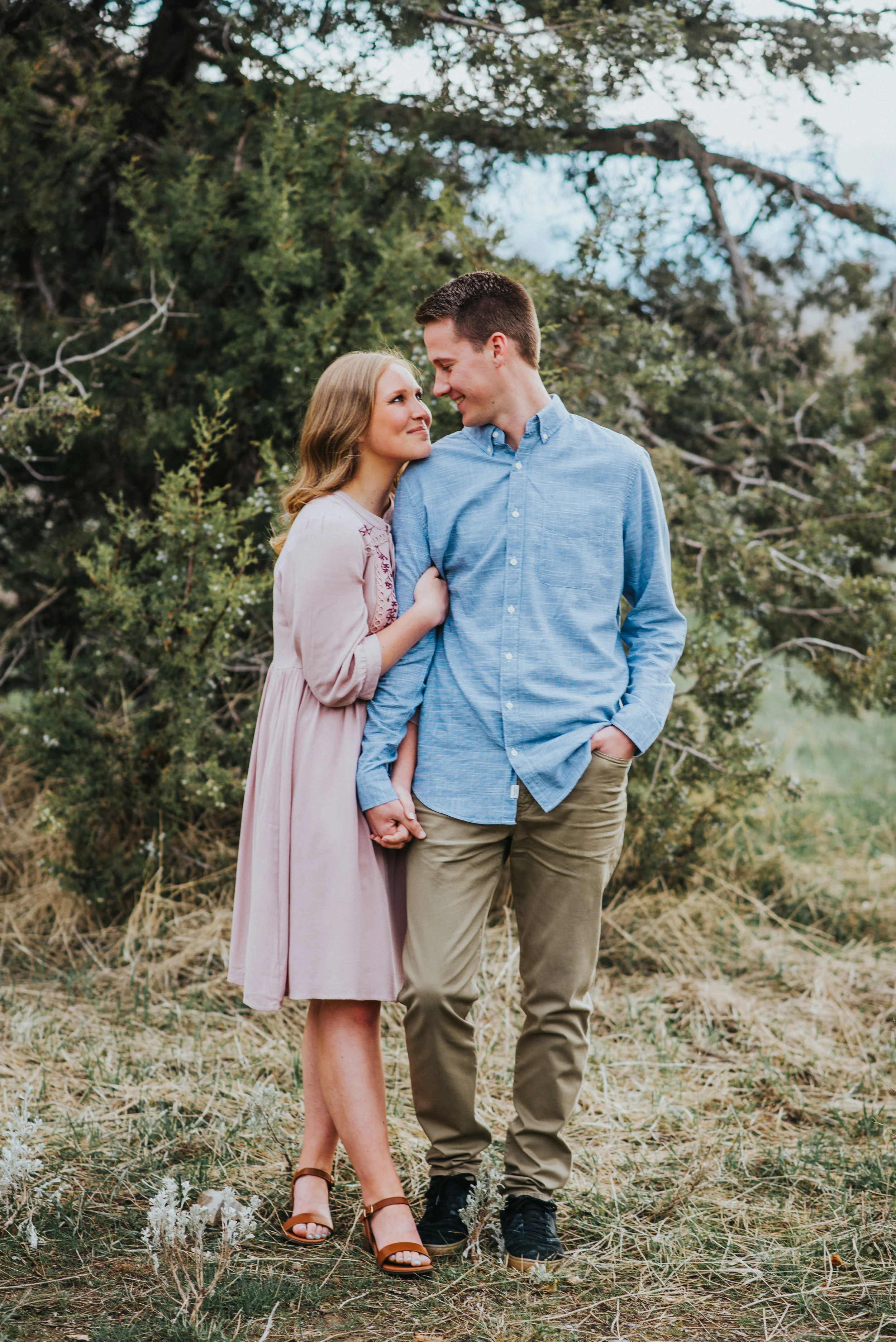  Logan utah green canyon engagement session adventurous couple what to wear to engagement session engagement outfit inspo semi-formal outfit inspo hairstyles for engagement photos couple holding hands couple standing together couple posing ideas coup