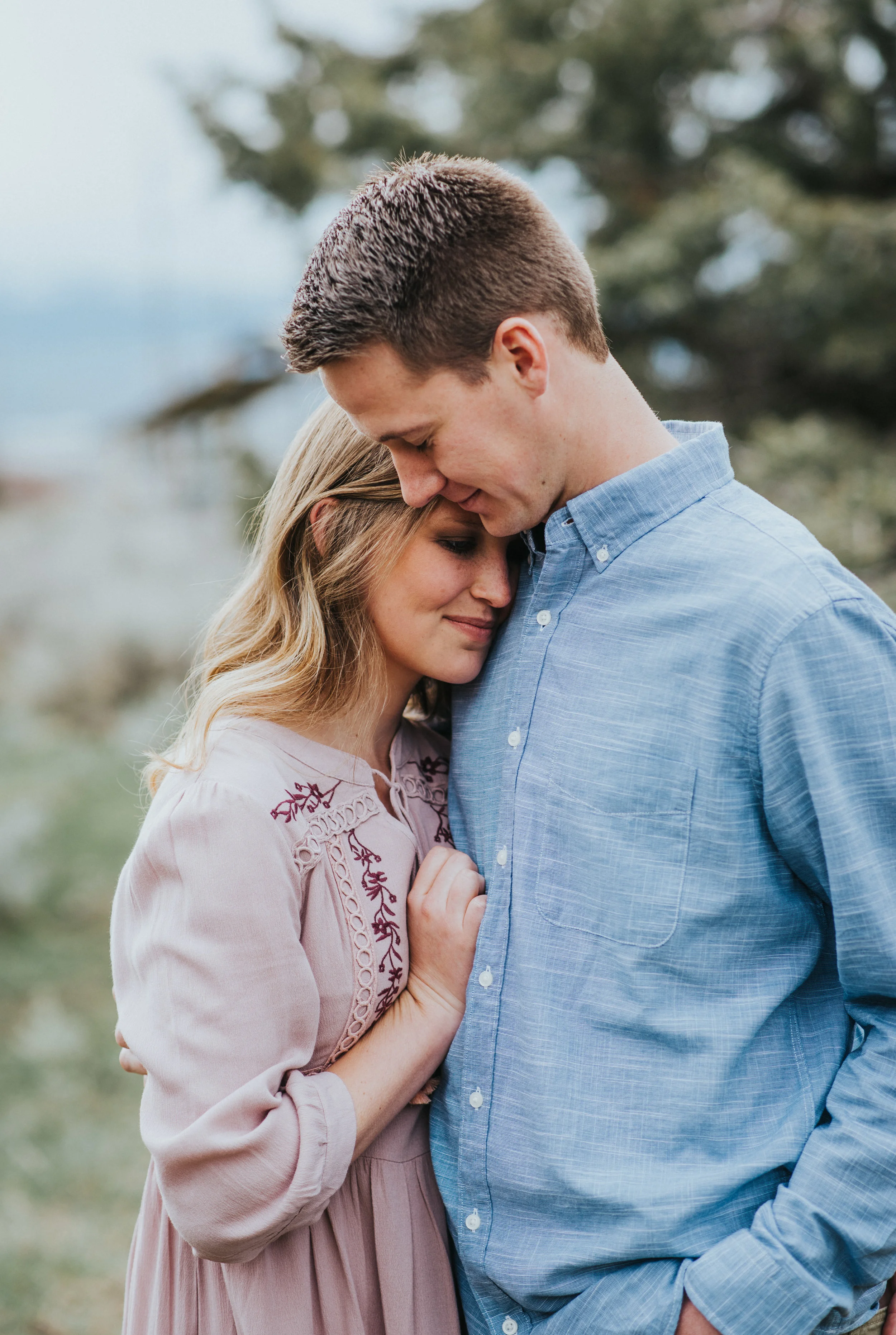  Logan Utah green canyon engagement session engagement photos couple posing ideas what to wear to engagement sessions pink and blue outfit inspo semi-formal outfit inspo couple leaning in posing ideas forehead together posing ideas curly hairstyles f