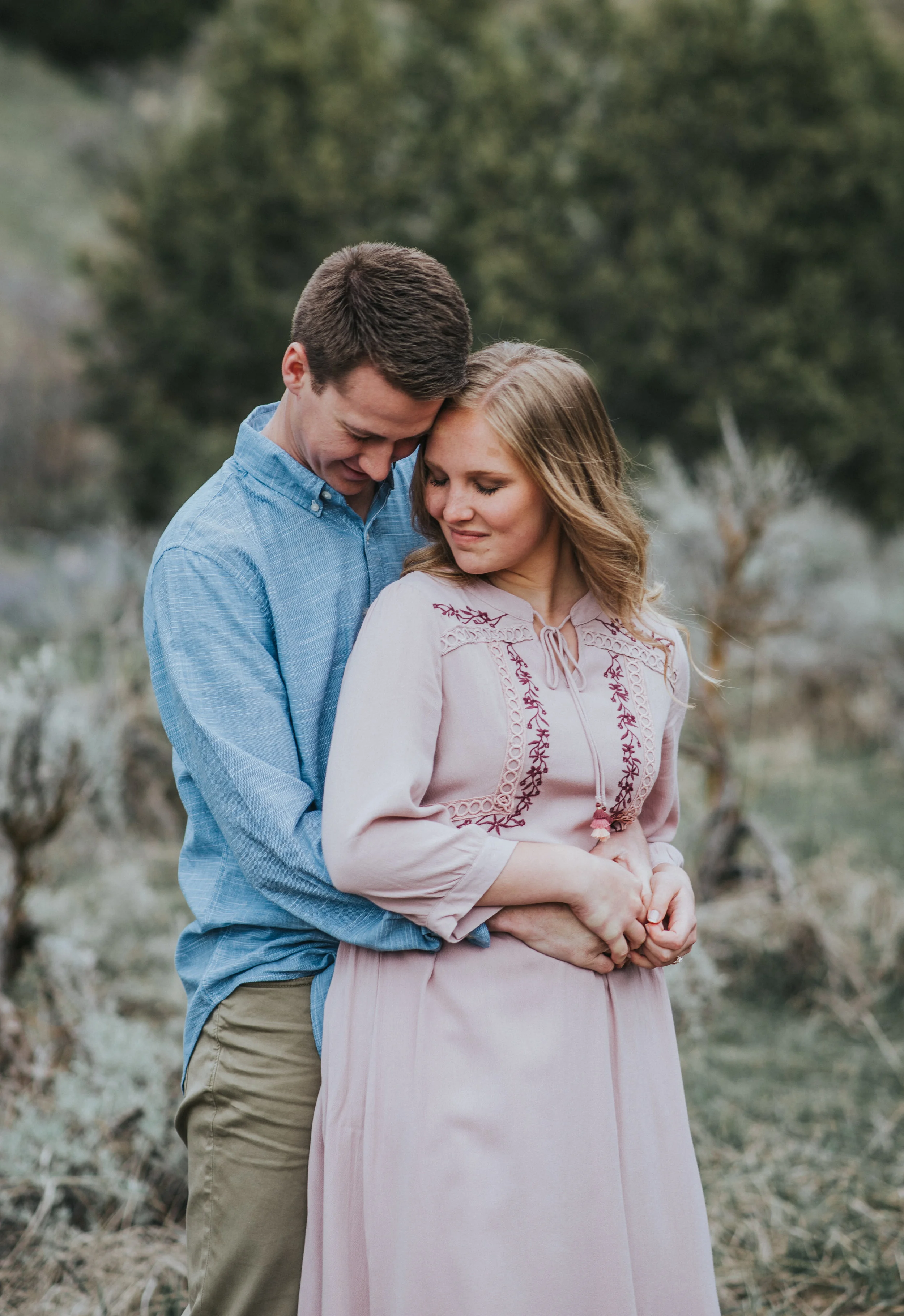  Green canyon engagement session Logan utah engagement photo ideas couple posing ideas arms around waste guy behind girl posing ideas foreheads together posing ideas what to wear to engagement photos blue and pink outfit inspiration engagement photo 