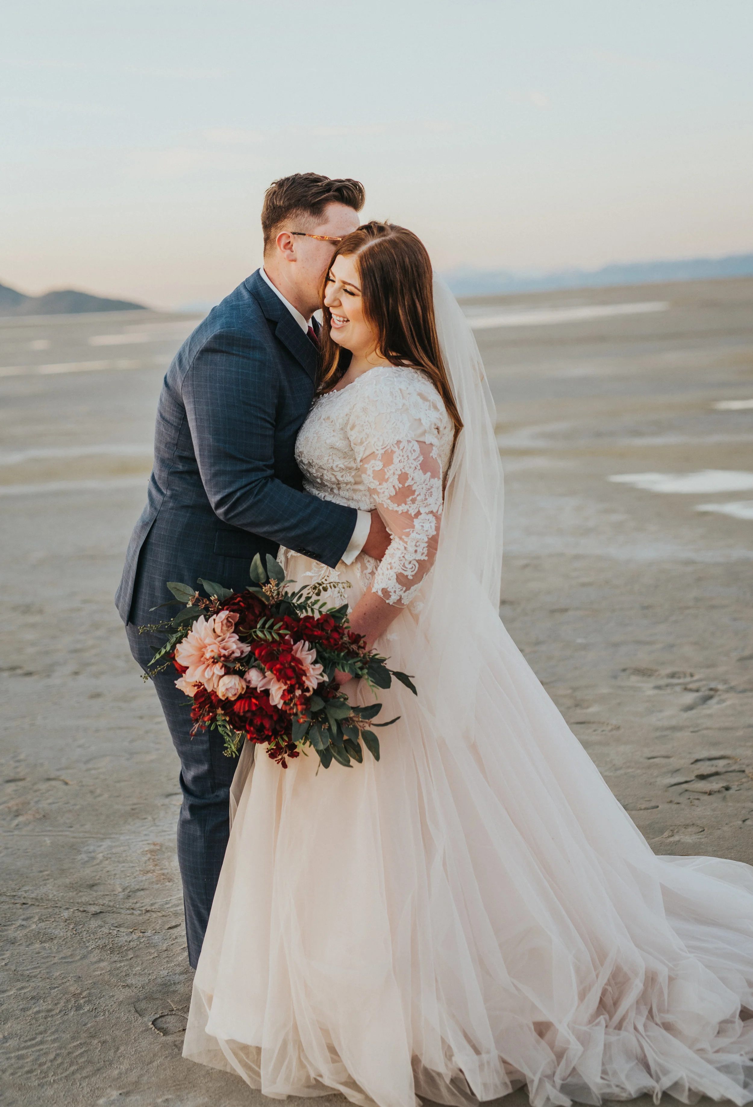  sweet moment between husband and wife glowing couple beautiful couple pose modest lace wedding dress princess style wedding dress beautiful bride formal wedding photo shoot lds couple inspiration #ldswedding #mormon #utah #saltlakecity #formalweddin