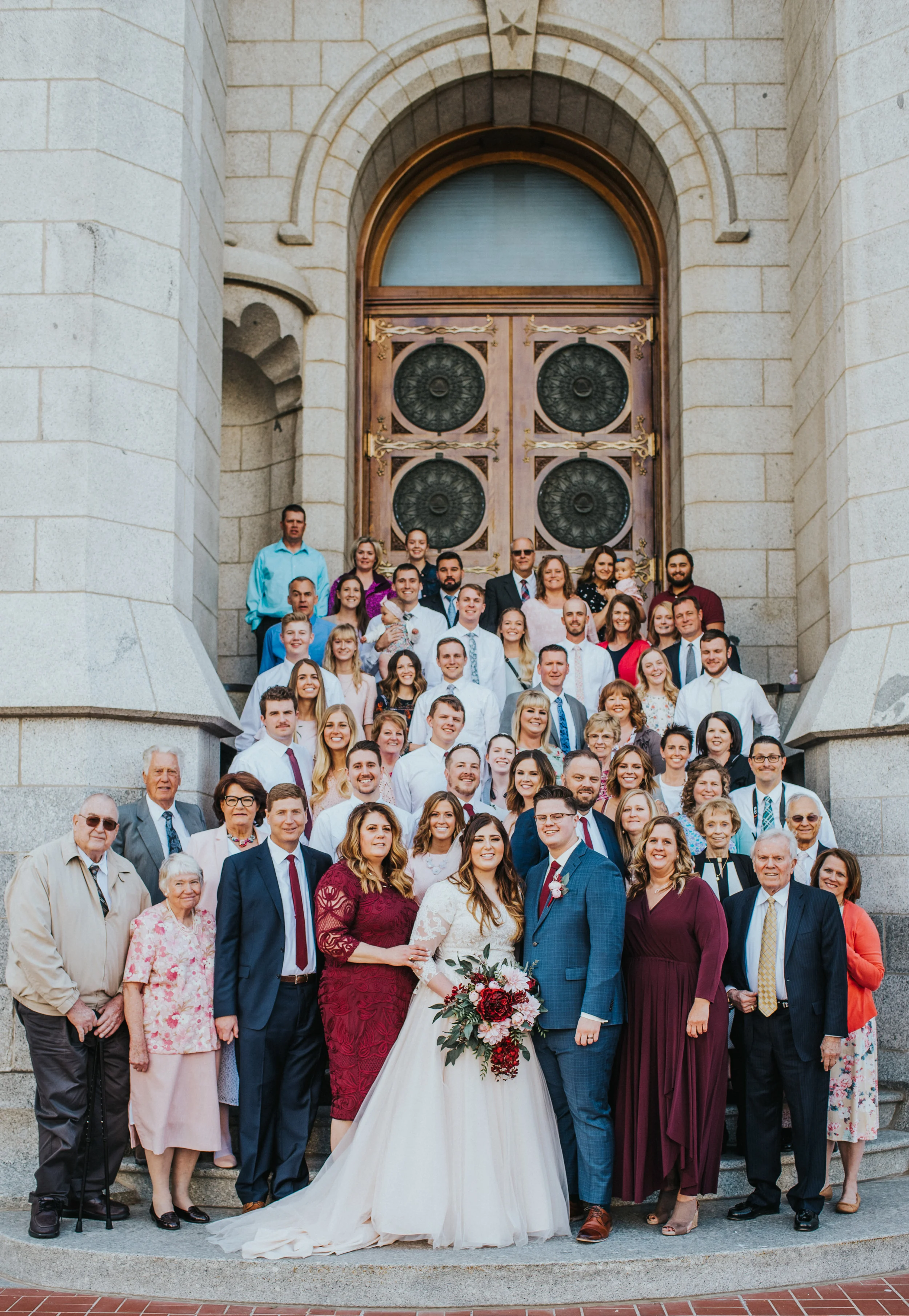  salt lake wedding photographer salt lake city temple wedding day photos family photos temple step pictures group shot wedding dress suit and tie happy couple simple wedding happily ever after sealed for eternity spring wedding temple square classy w
