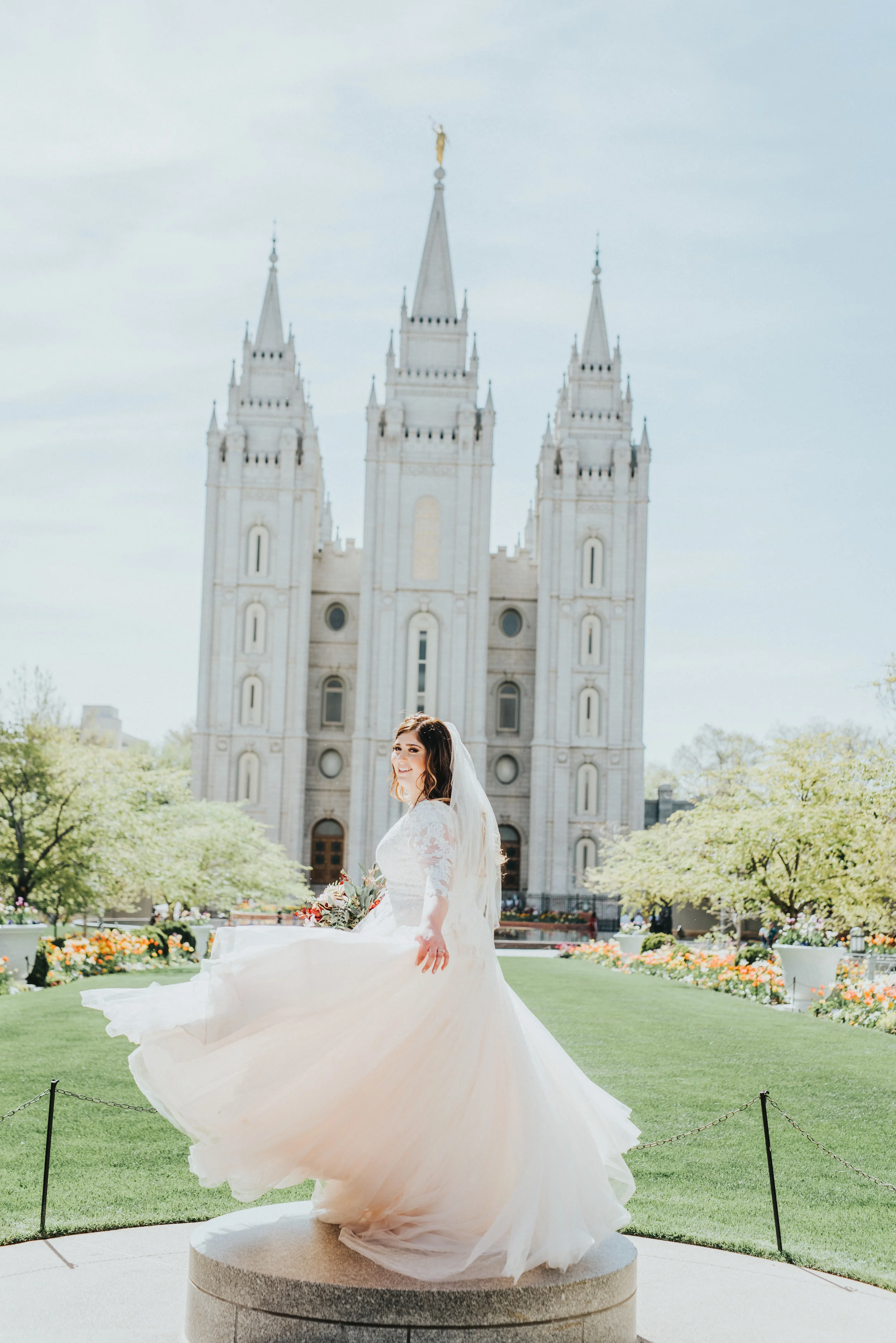  salt lake wedding photographer salt lake temple pedestal pictures wedding dress twirling pictures bride posing ideas beautiful bride joyful bride ball gown wedding dress ideas happy bride happily ever after traditional bride spring wedding may weddi