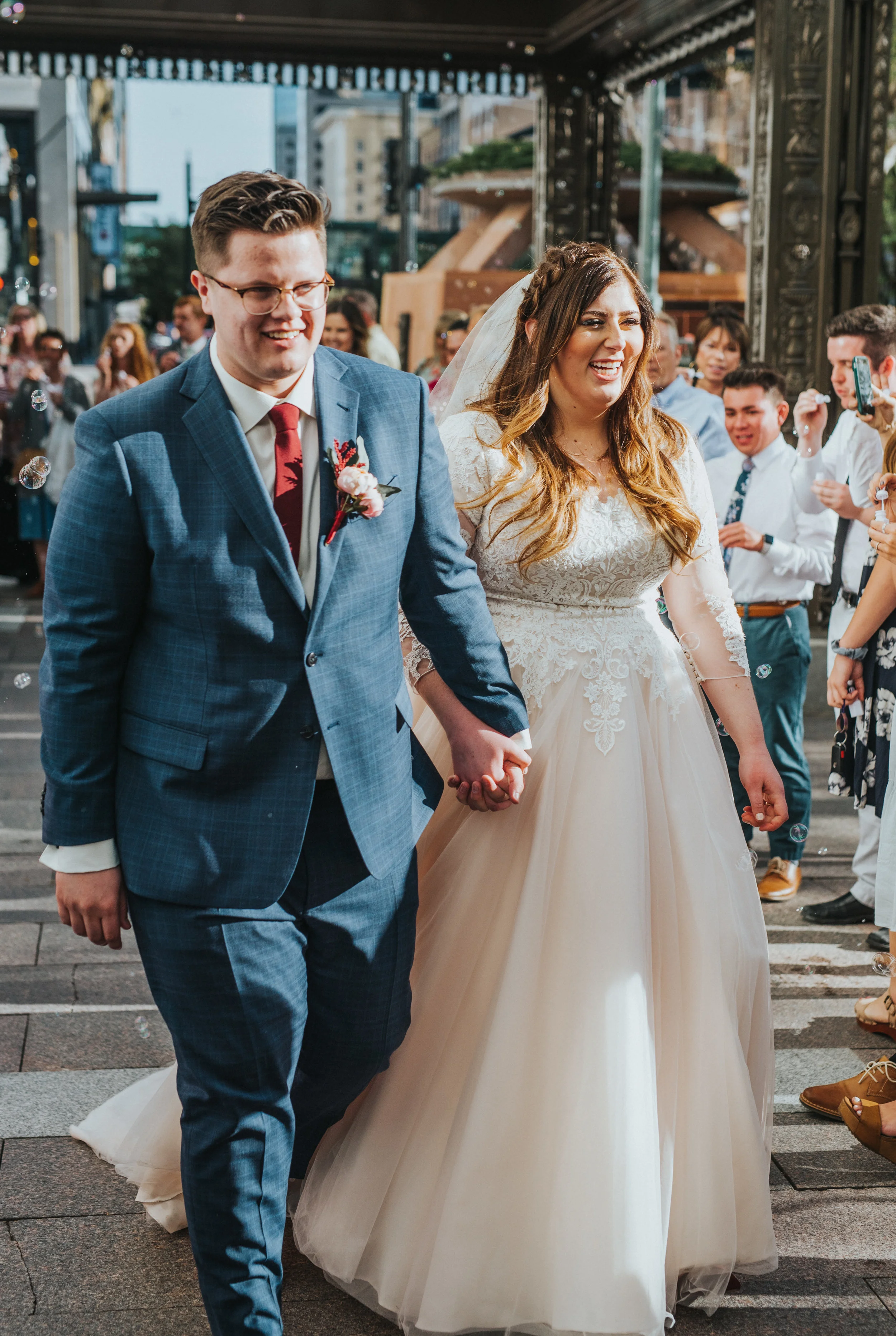 Utah bride and groom temple square salt lake wedding photographer blue suit inspiration wedding dress goals lace wedding dress ball gown wedding dress inspiration couple holding hands wedding day happily ever after joyful wedding day photos couple w