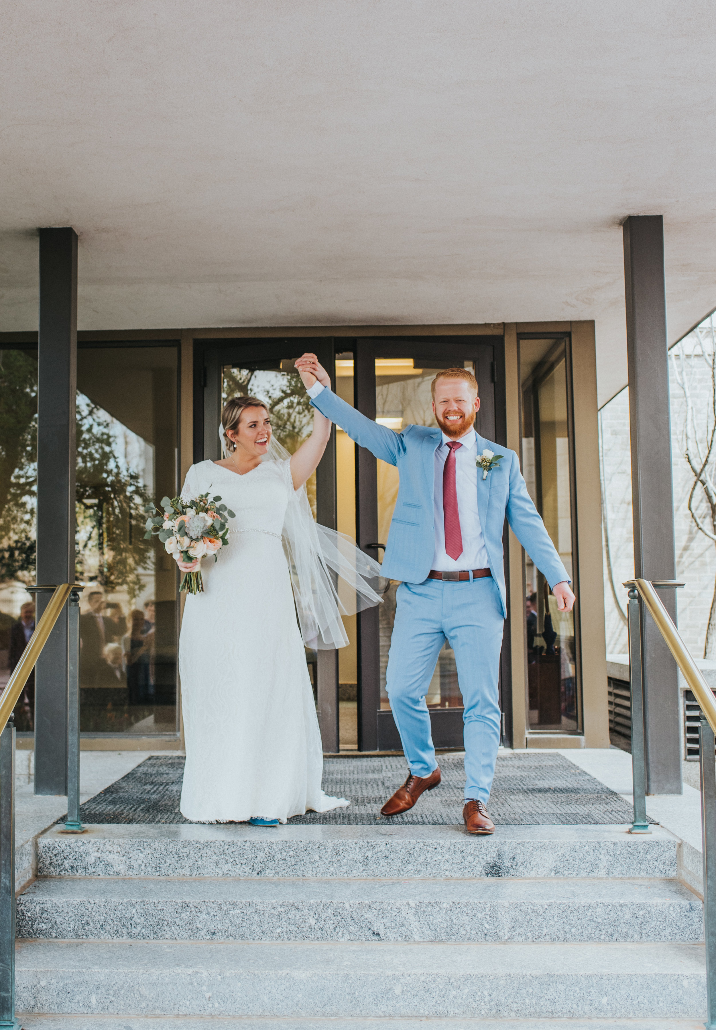  Tying the knot wedding celebration wedding exit holding hands happy long veil salt lake city temple powder blue wedding suit pastel wedding bouquet #northernutahweddingphotographer #saltlakecityphotographer #weddingphotos #weddingday #saltlaketemple