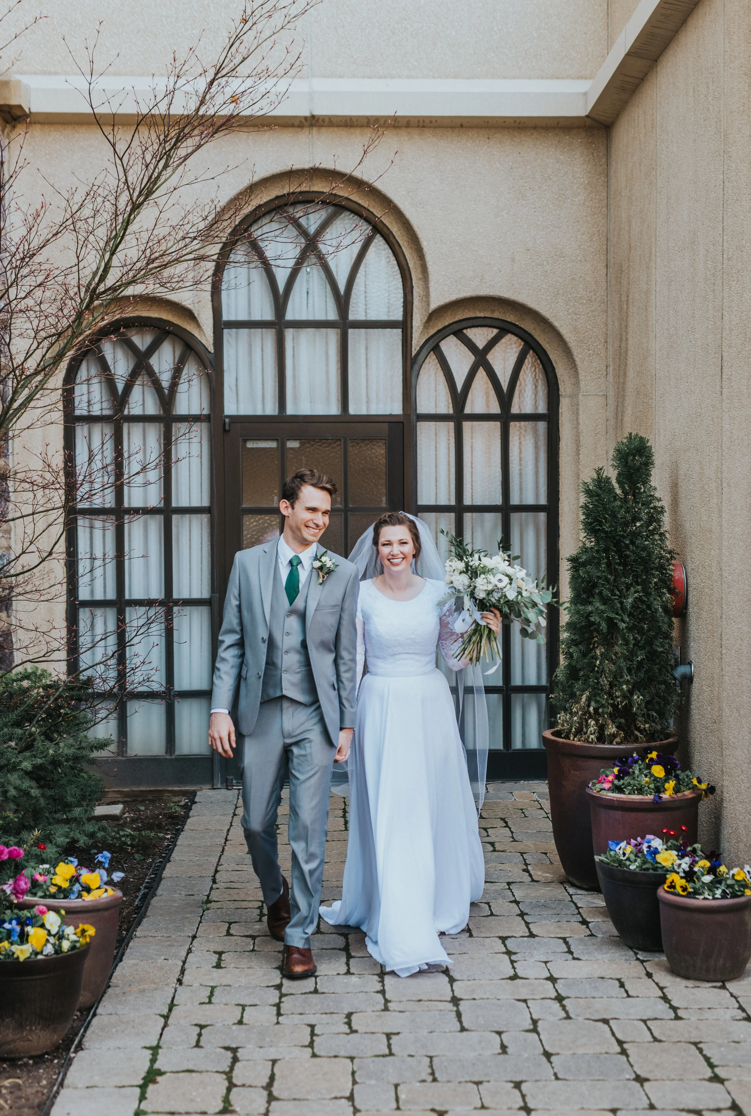 Cache valley wedding photographer Logan utah Logan LDS temple bride and groom married for eternity temple exit just married wedding dress Inso wedding bouquet happy couple in love couple grey wedding suit wedding hair and make up inspo beautiful cou