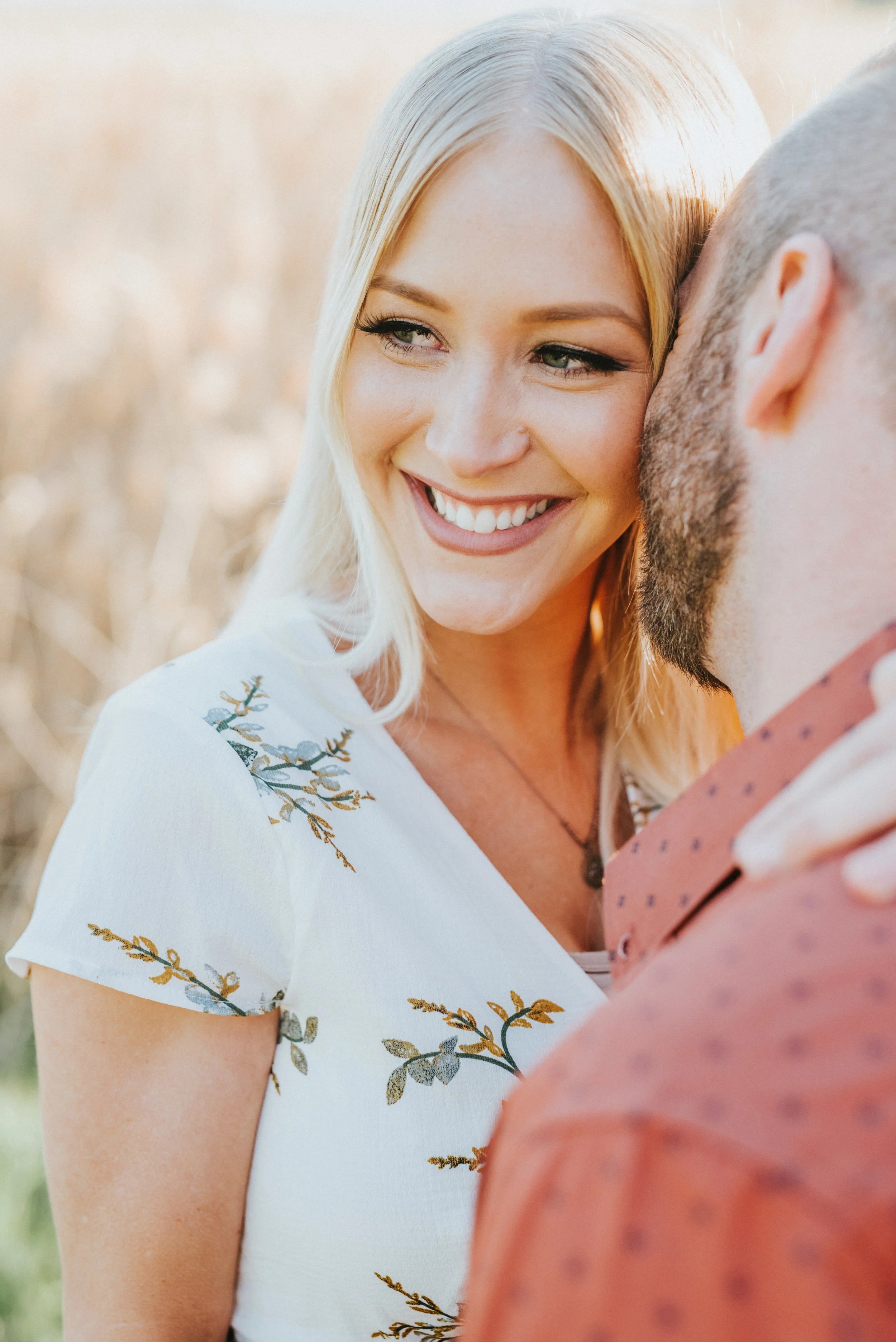  tunnel springs utah engagement photography northern utah professional photography bohemian engagements hugging kissing happy romantic tall grass  fall family photos floral sun dress faded haircut blonde hair inspiration #engagementphotography #nothe