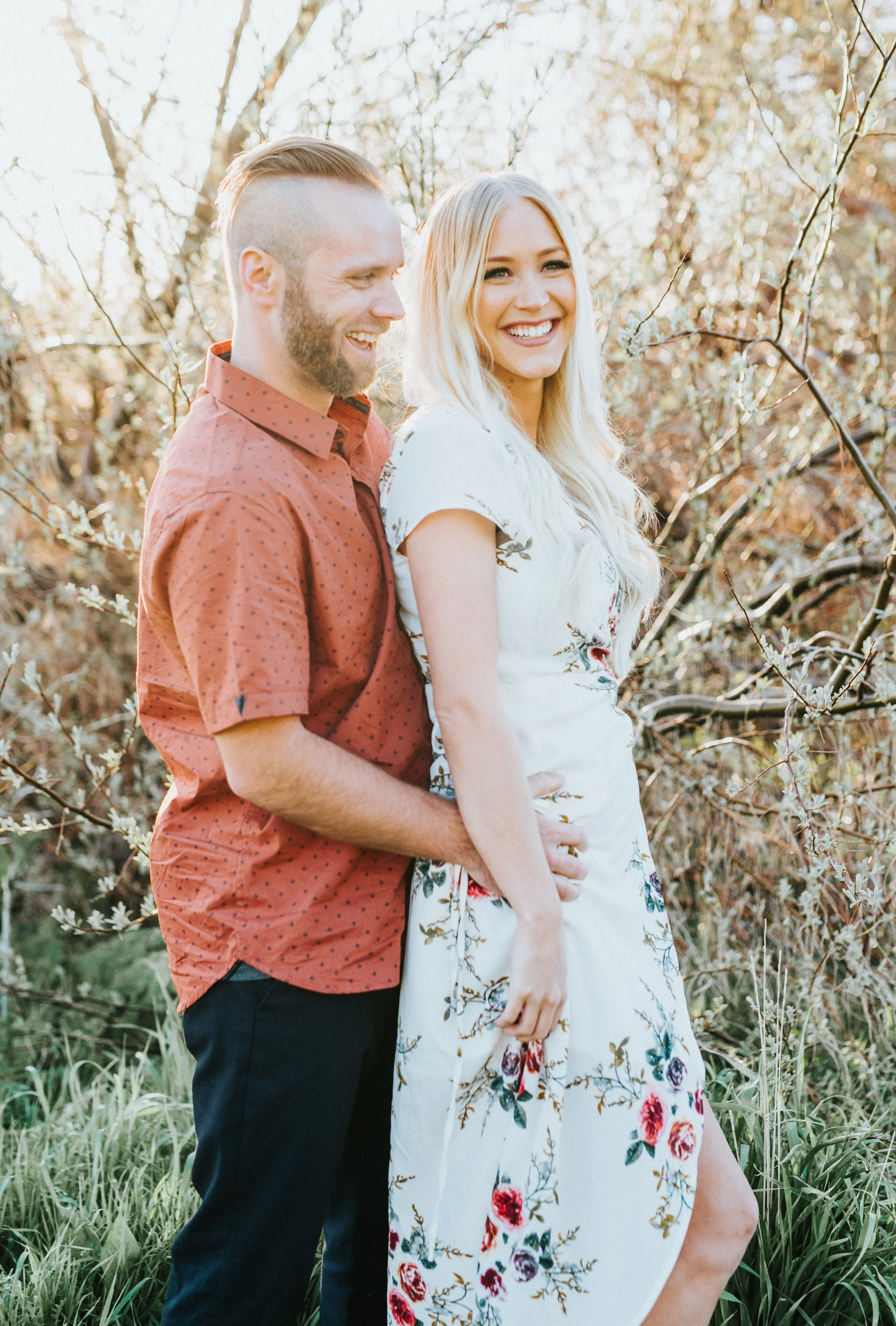  tunnel springs engagement session nature bohemian styled engagement hair inspiration fall engagement floral long dress hugging laughing playful romantic #engagementphotography #nothernutahphotographer #loganutah #tunnelsprings #fallengagementsession