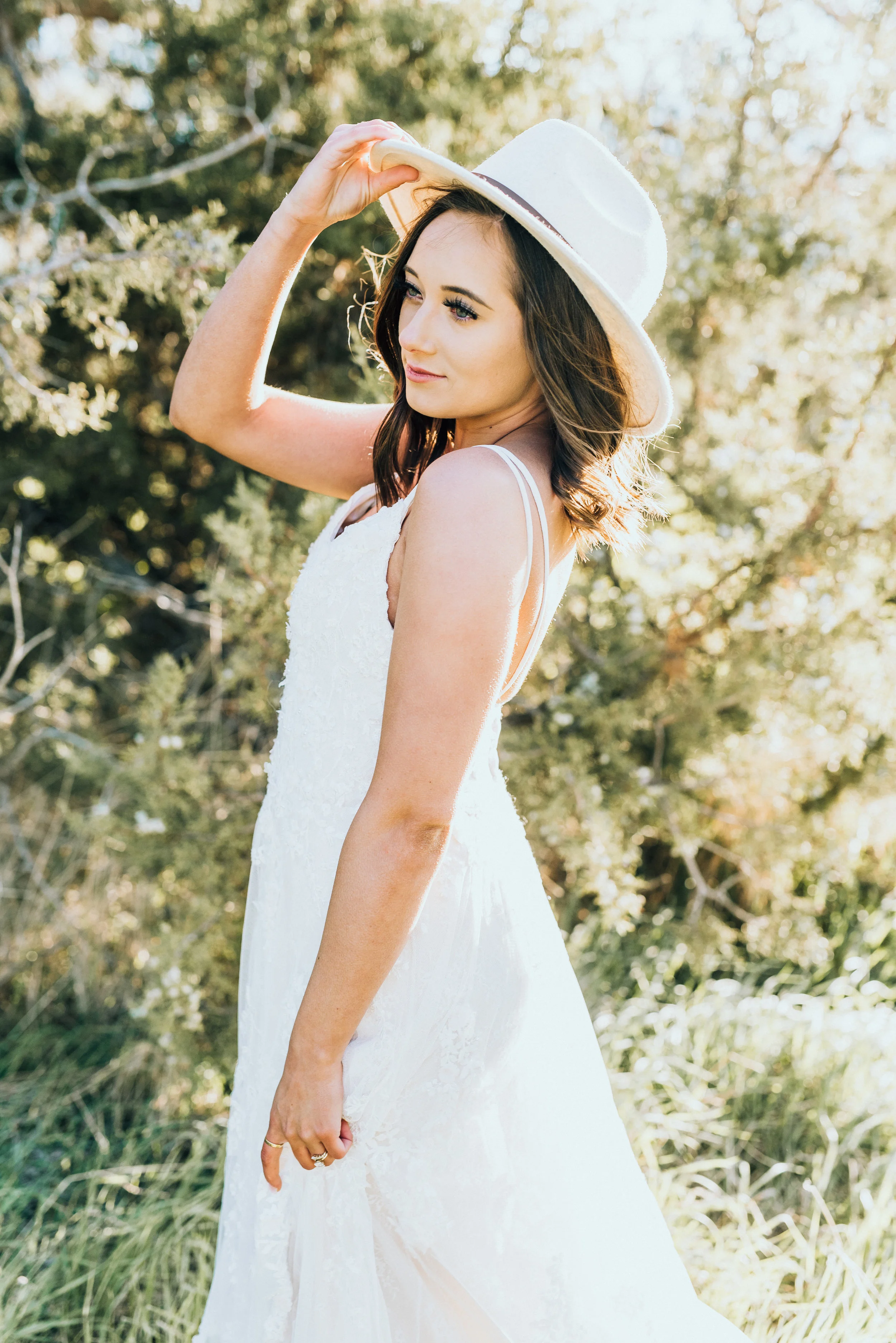  green canyon logan utah northern utah wedding photographer strappy beaded wedding dress bridal portraits loose brown curls hair inspiration outdoor bridals fedora #greencanyon #northernutahweddingphotographer #bohemianwedding #utahbridals #weddingac