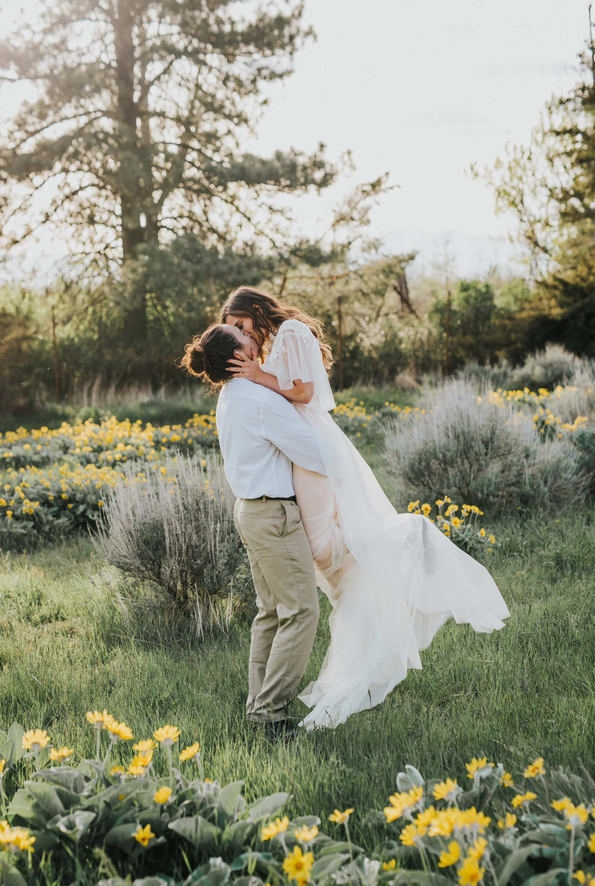  the focus collective workshop logan utah wedding photographer bridal session formal session wedding dress bride and groom ball gown wedding dress modest wedding dress adventurous couple couple in a field of flowers couple posing ideas wedding hair i