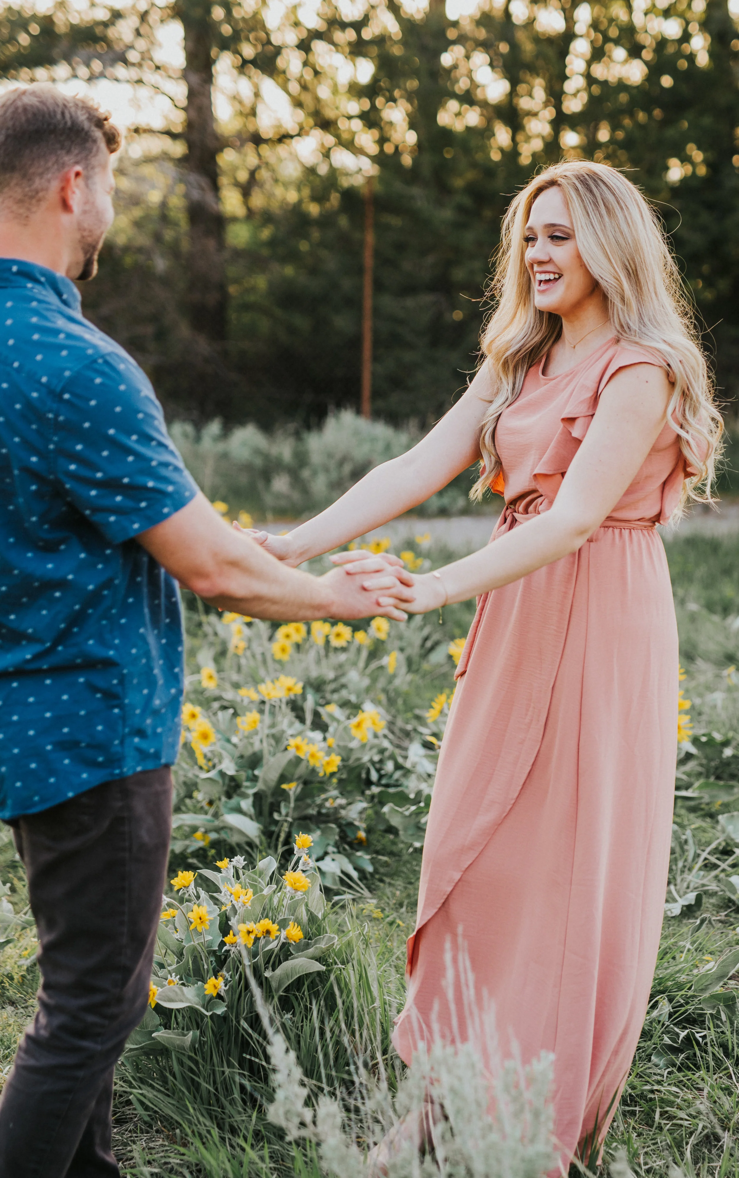  the focus collective workshop photographer workshop mentor session couple session couple formal session semi casual outfit ideas blue and pink outfit ideas couple posing in a field couple posing by wildflowers couple holding hands couple posing idea