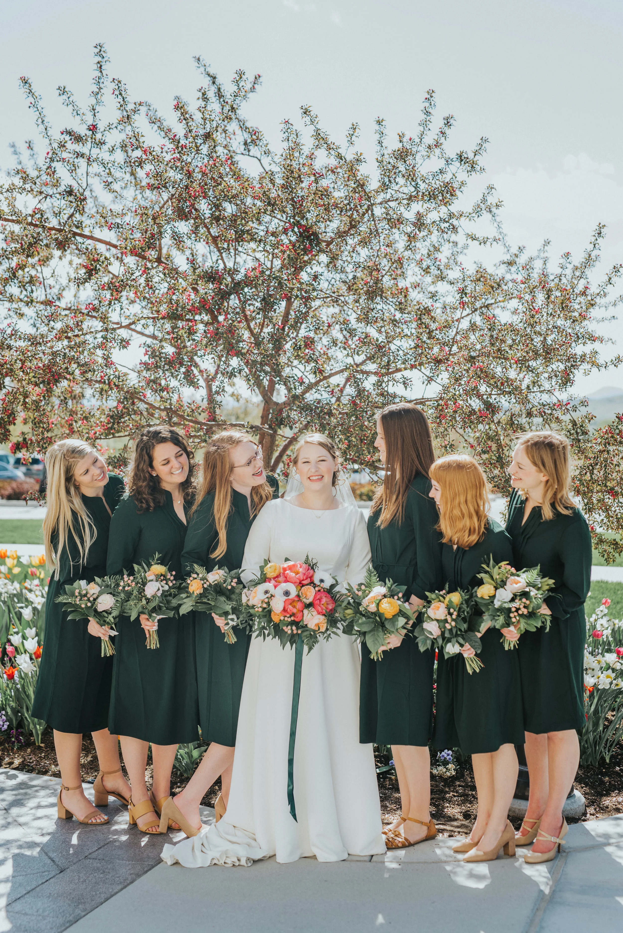  emerald green bridesmaids dresses nude heels poppy pink peach wedding floral bouquet payson utah lds temple wedding grounds happy candid wedding poses payson utah wedding photographer #professionalutahphotographer #paysonutah #northamptonhouse #ido 