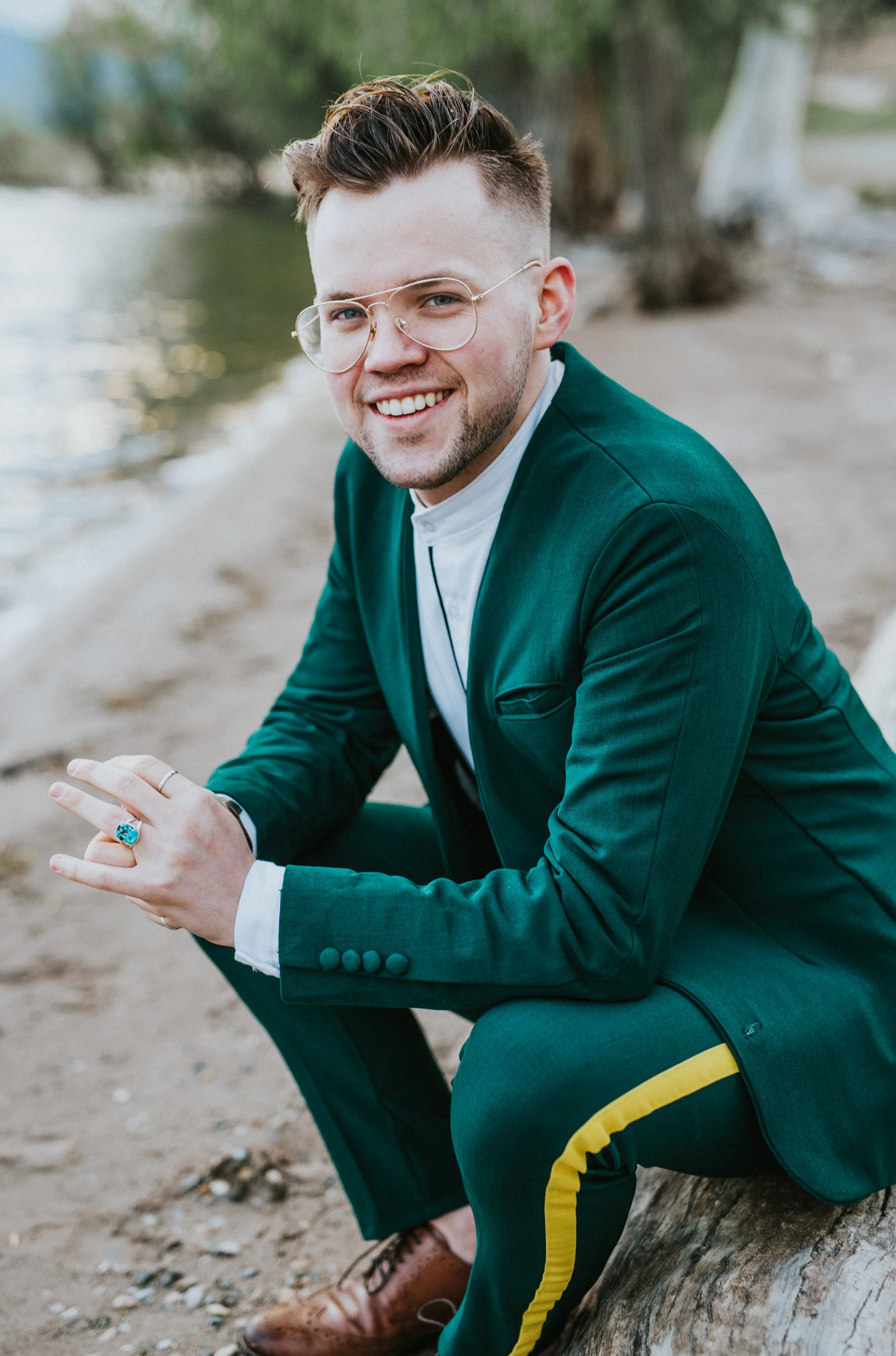  hyrum reservoir bridal photos groom forrest green wedding suit yellow stripe handmade wedding band vintage glasses mountain background water logan utah northern utah wedding photographer #cachevalleyutah #hyrumutah #northernutahphotographer #bridals