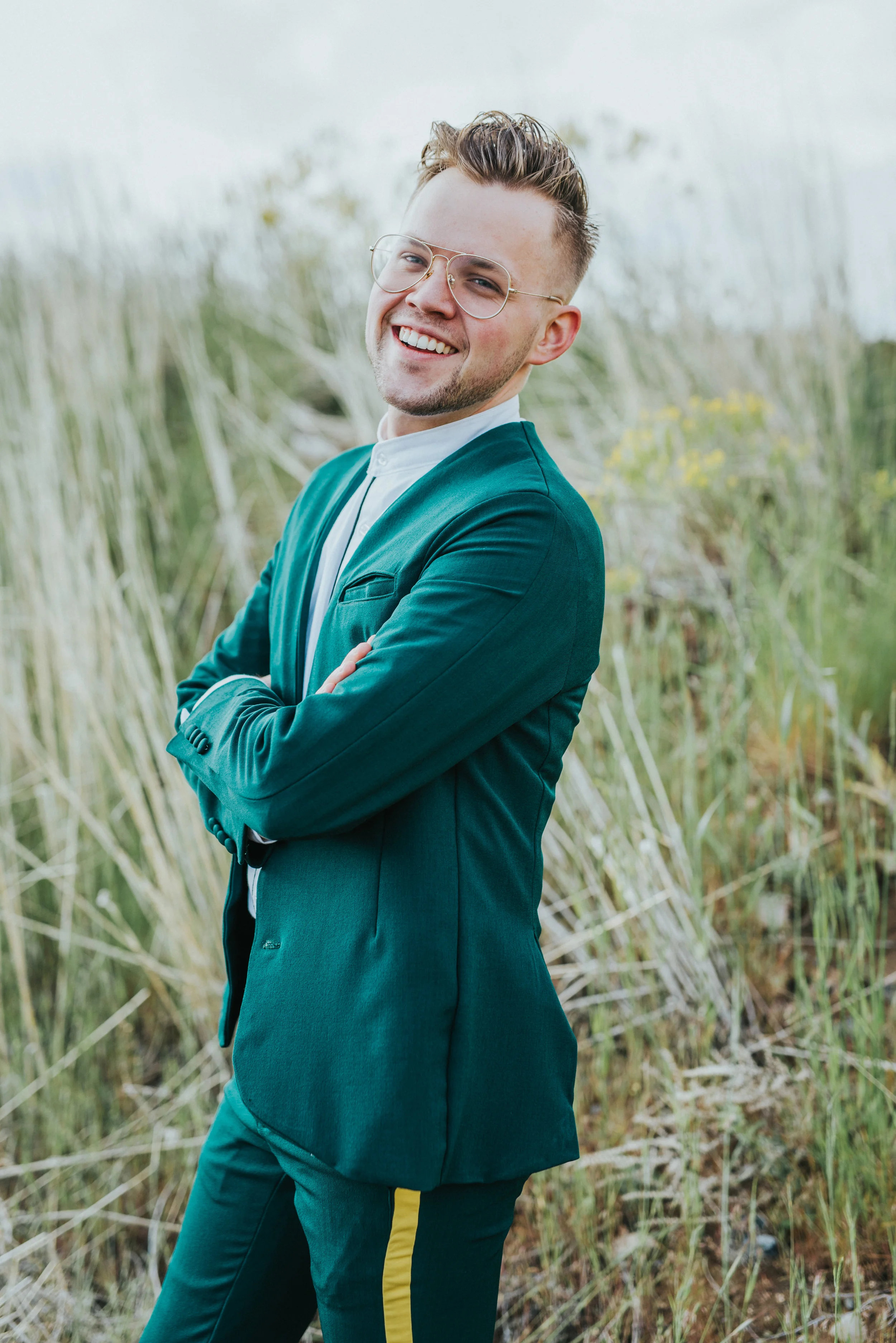  emerald green wedding suit yellow striped retro slacks smiling retro glasses groom bridal portraits hyrum reservoir northern utah professional wedding photographer #cachevalleyutah #hyrumutah #northernutahphotographer #bridals #hyrumreservoir #black