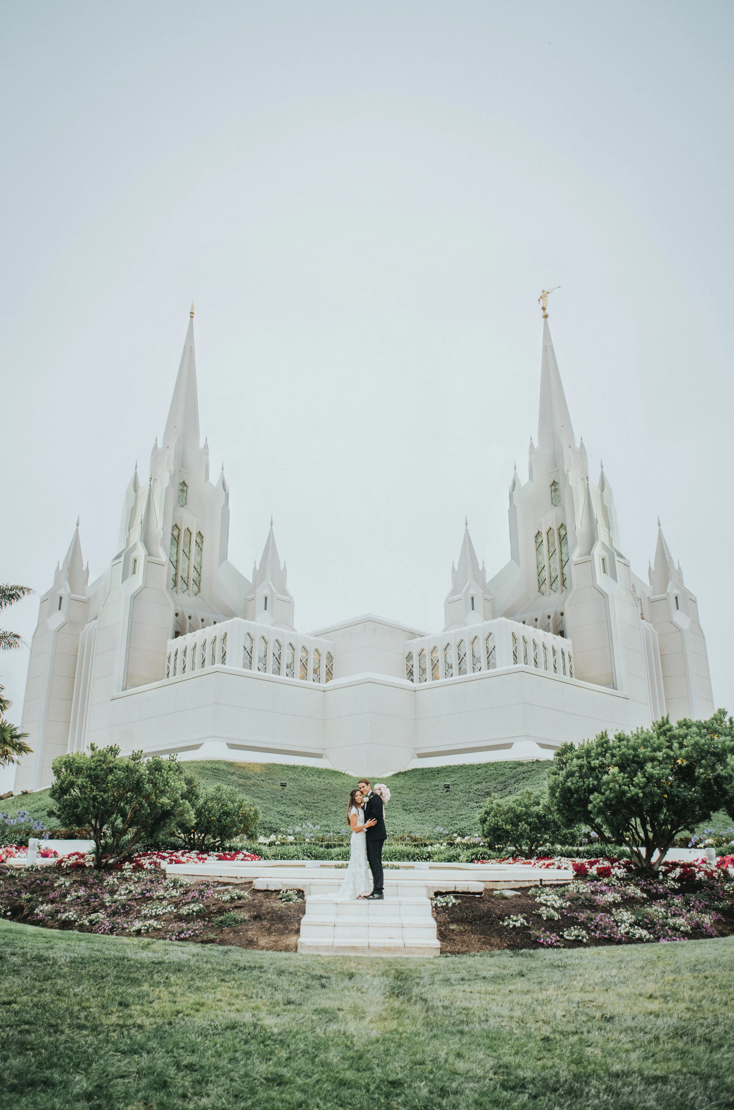  san diego temple wedding lds modest beaded wedding dress happy hugging smiling formal photos san diego wedding photography northern utah wedding photographer temple grounds #lajollacaliforniaweddingphotographer #sandiegotemple #windanseabeachcalifor