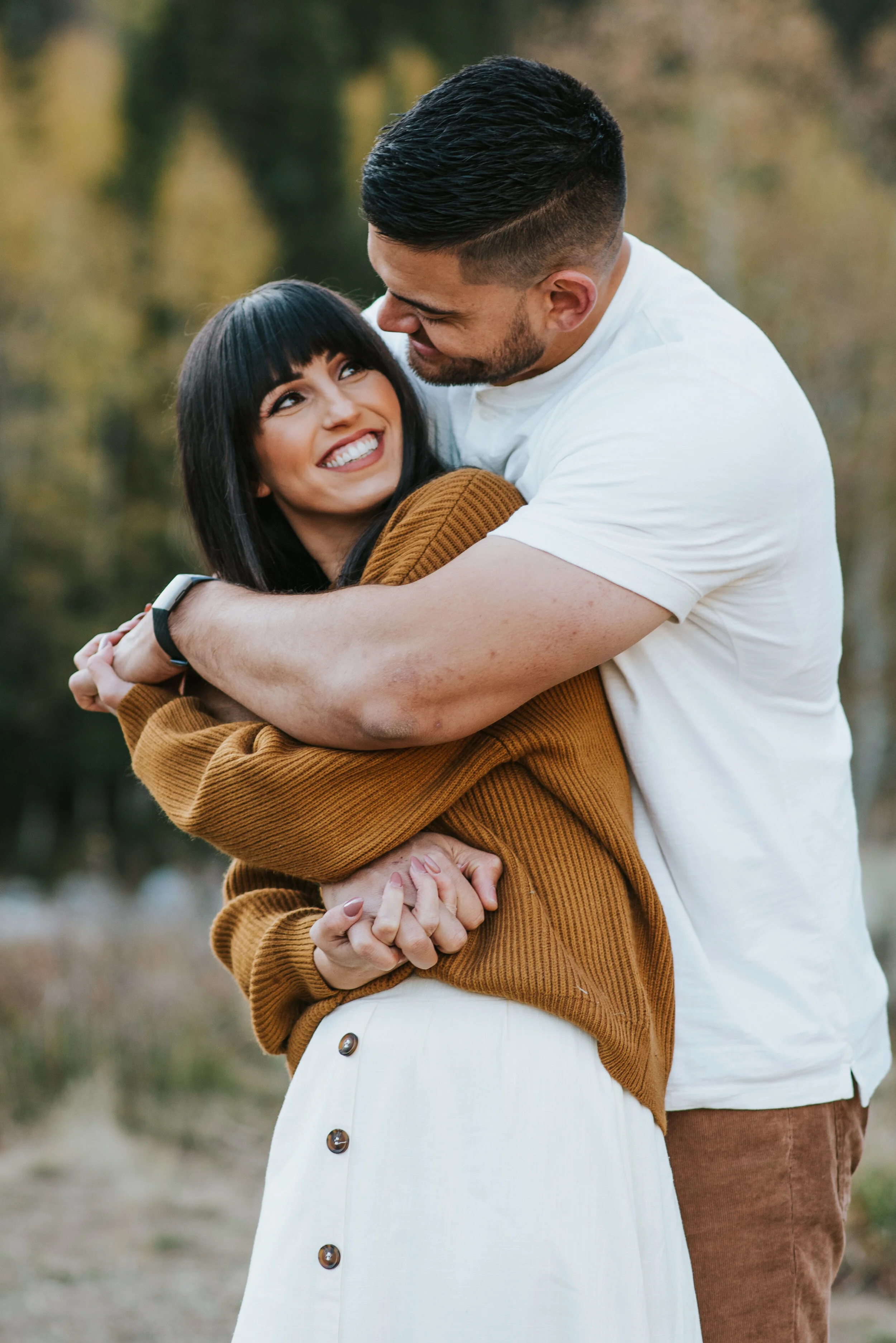  hugging picture during family portraits camel colored outfit inspiration fall family photos mom and dad professional family photographer in northern utah logan utah family pictures with kristi alyse photo #kristialysephoto #familyphotographer #famil