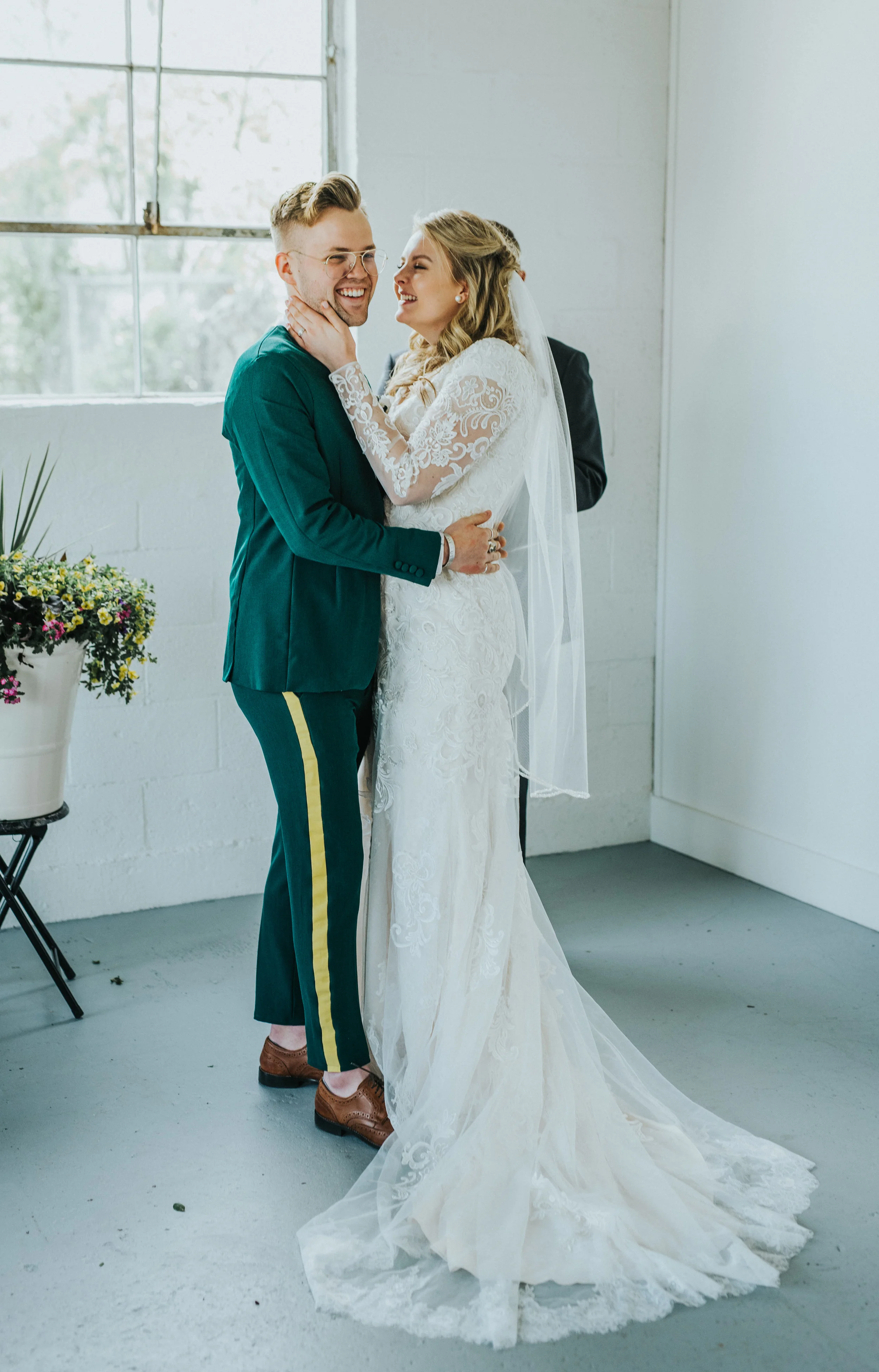  white studio wedding ceremony minimalist emerald green wedding suit yellow striped dress pant vintage mens glasses hair inspiration loose blonde wedding curls i do just married professional logan utah wedding photographer #StationStudio #WeddingCere