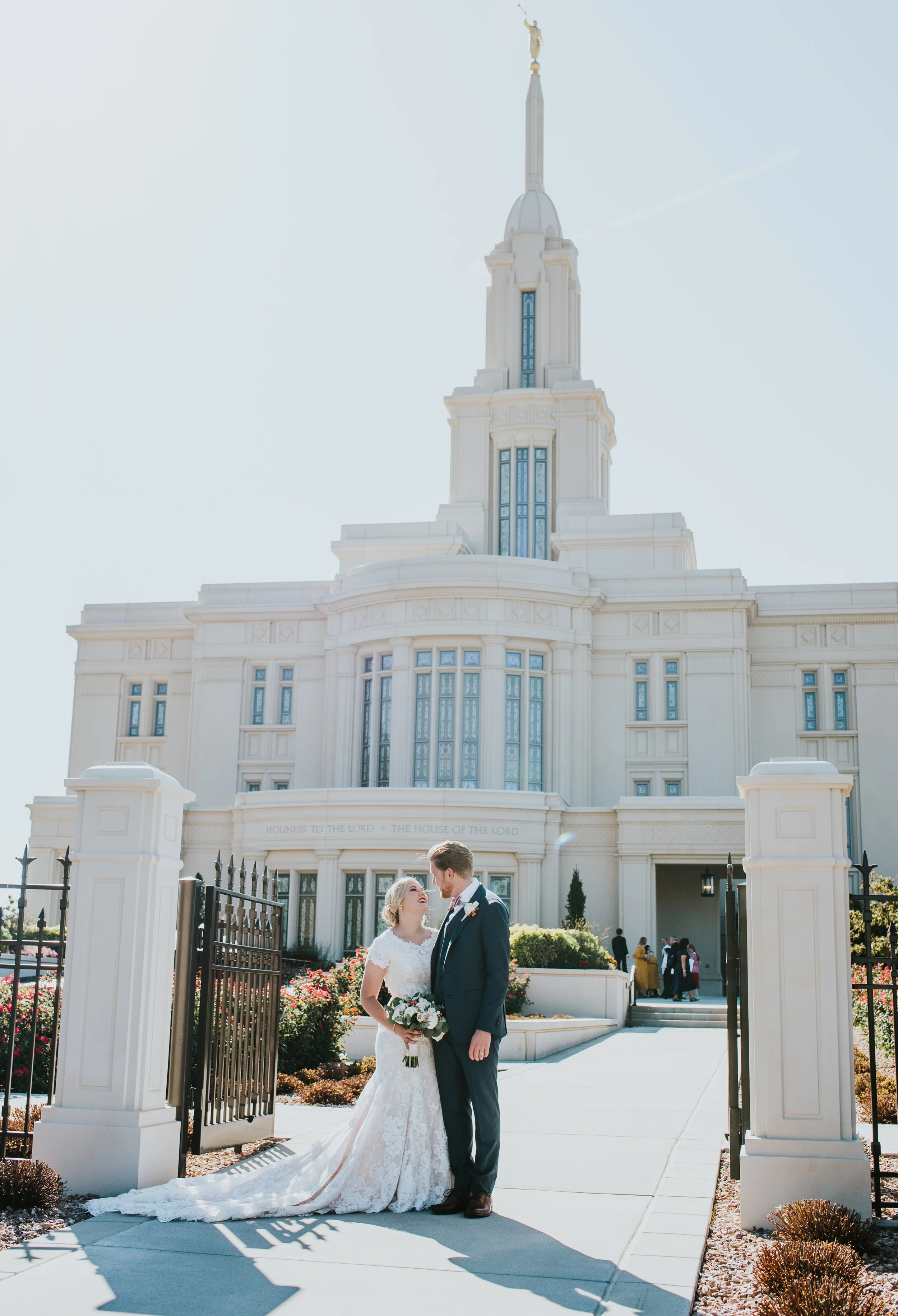 Payson Utah Temple Payson utah sealed for eternity just married bridal pictures pictures outside the temple wedding day suit and tie happy couple couple posing outside the temple modest wedding dress wedding flowers couple posing ideas couple standi