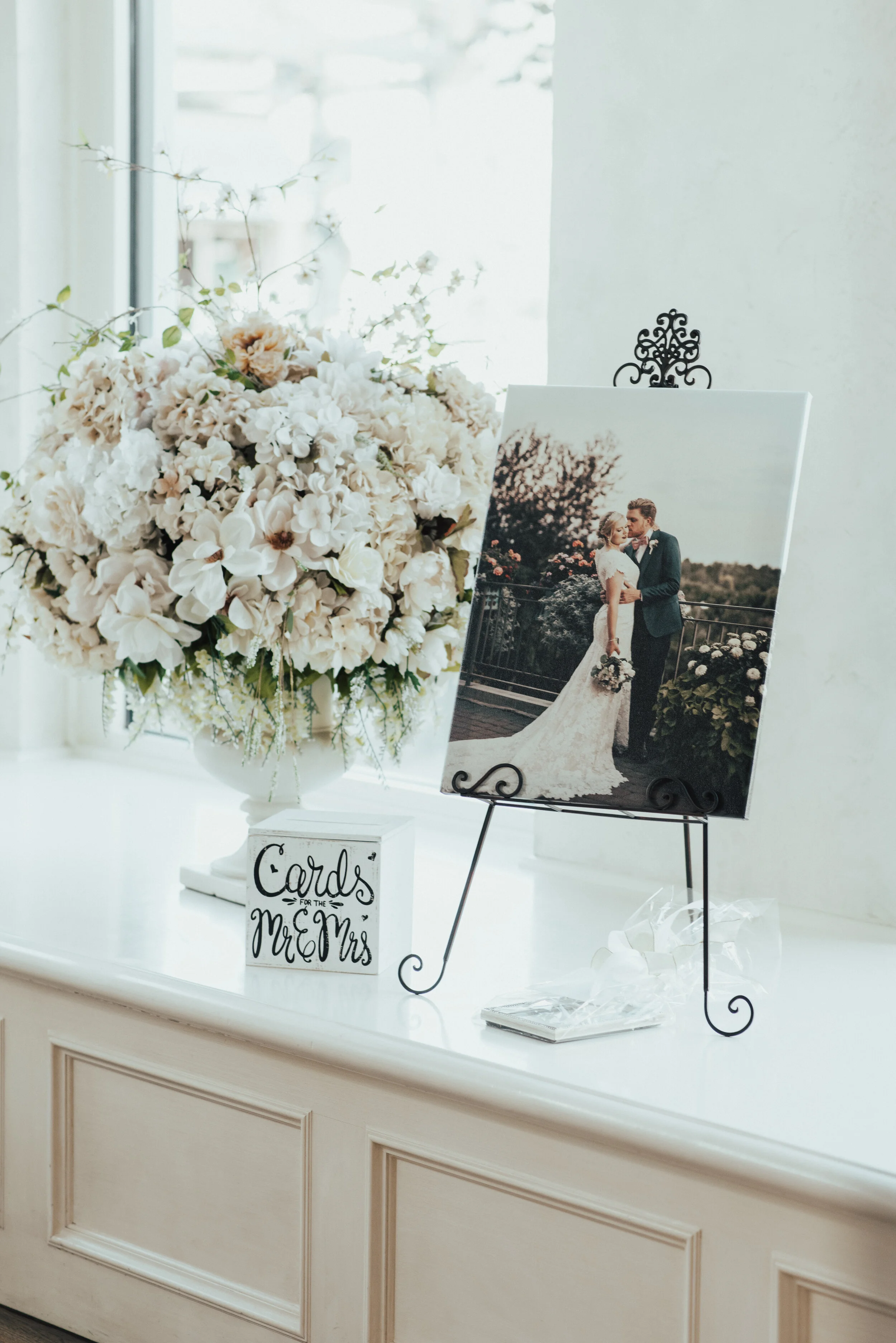  utah photographer display the manor at riverwoods reception center location ideas in utah canvas wedding portraits bride and groom couple posing ideas wedding decor ideas classy wedding decor flower arrangements white and pink wedding flowers weddin