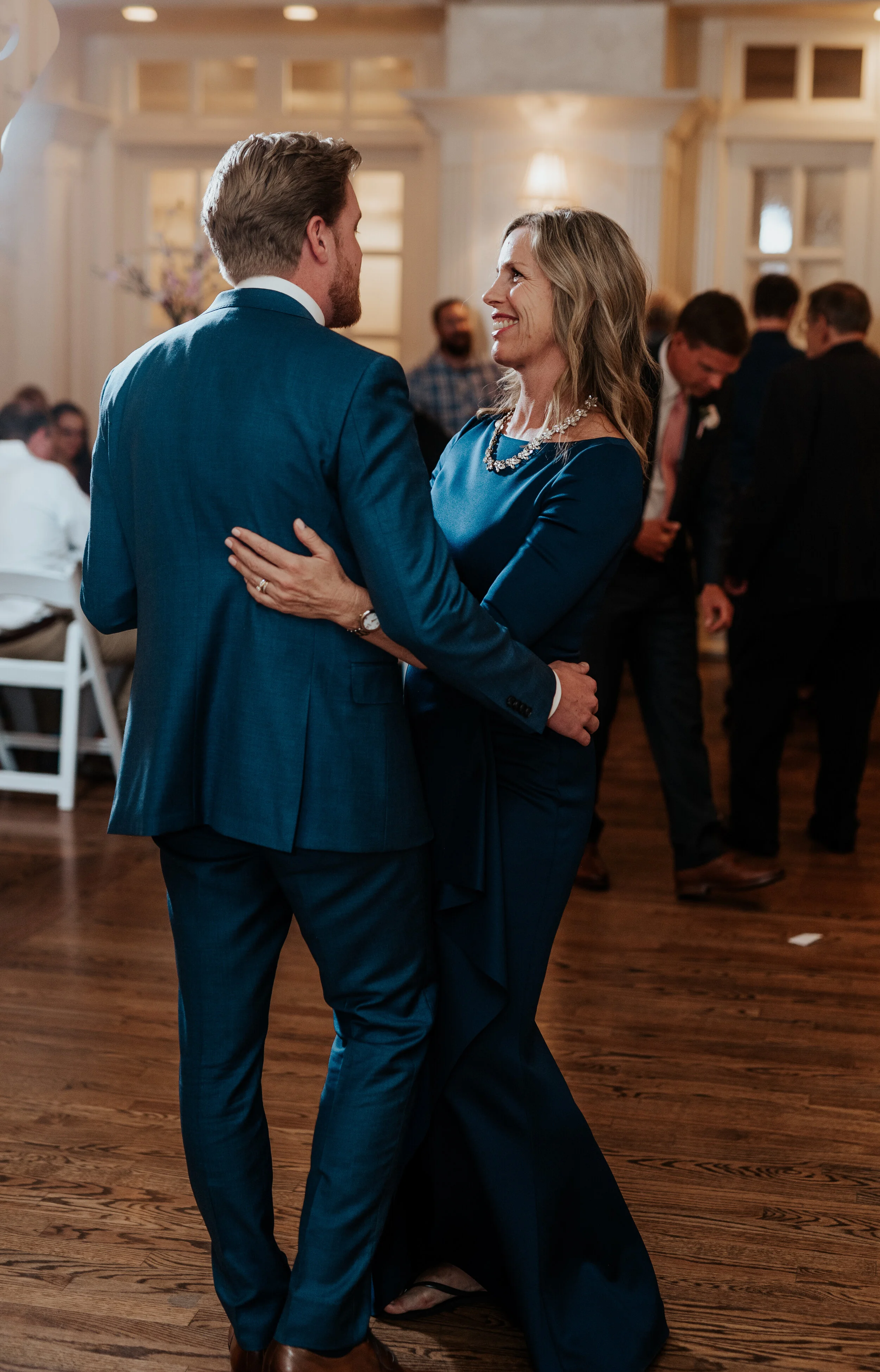  utah photographer wedding day photos reception center ideas reception location ideas in utah utah wedding classy wedding elegant wedding wedding dancing mother son dance happy family hairstyles for mother of the groom groom blue suit ideas suits for