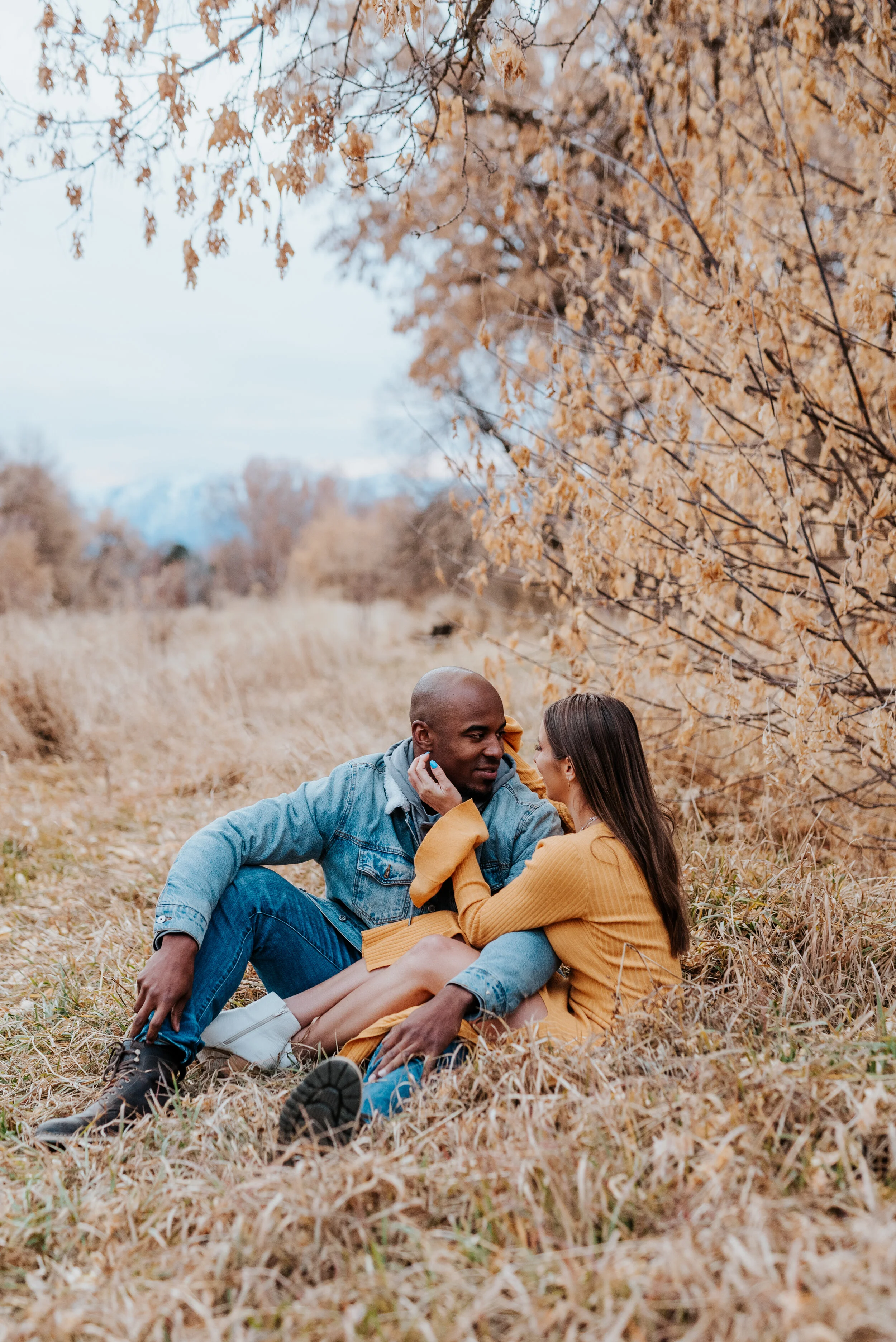  intimate couple photos cache valley photographer Logan Utah couple inspiration real couple romantic couple casual outfit inspo what to wear to couple sessions couple session posing ideas couple sitting down model couple winter photoshoot fall photos