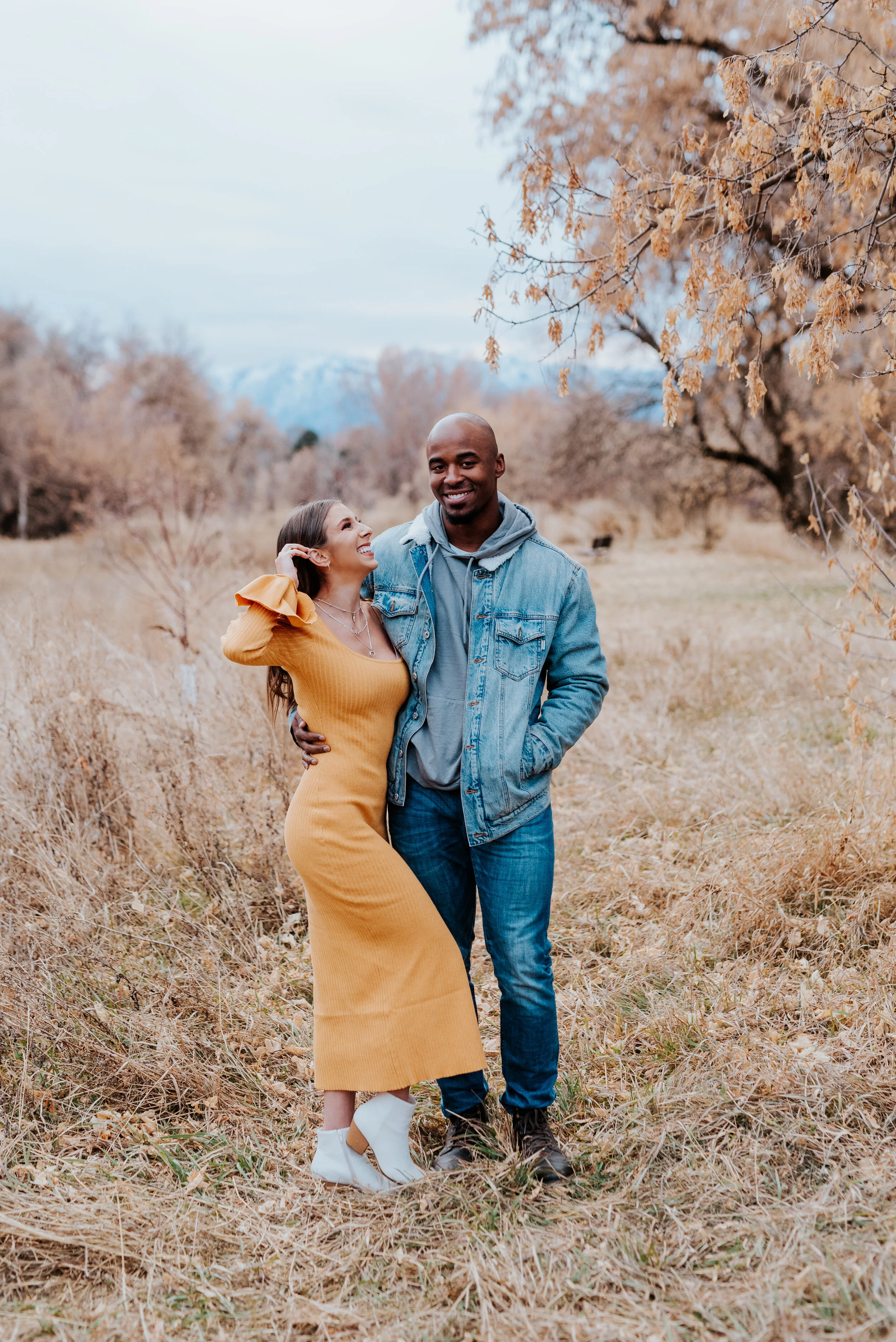  logan utah cache valley photographer couples session what to wear to couples session happy couple casual outfit inspo semi formal outfit inspo what to wear in the fall beautiful couple couple posing ideas couple standing together model couple mentor