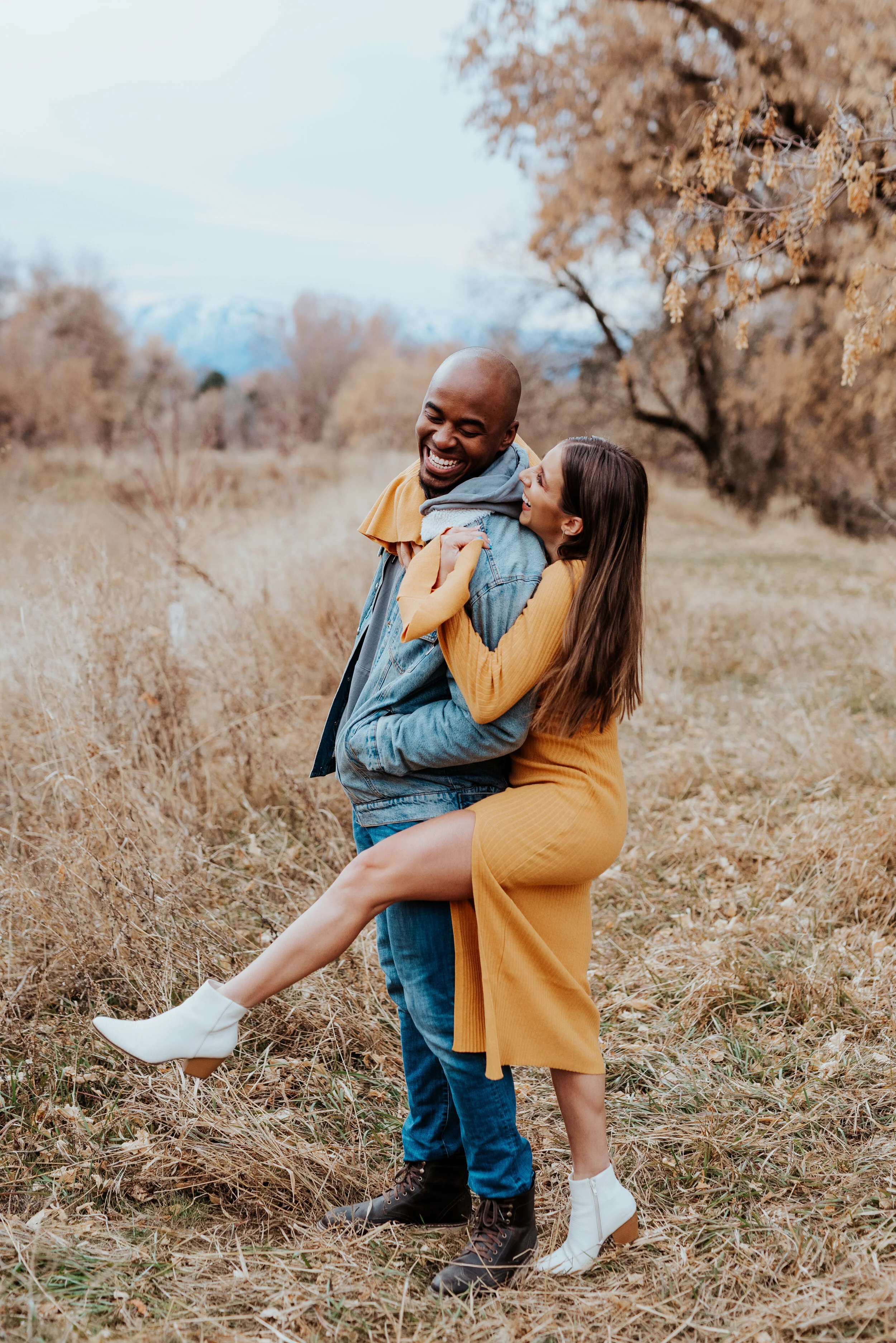  adventurous couple logan photographer couple session playful couple happy couple lovers mentor session makeup artist mua what to wear to couple session casual outfit inspo semi formal outfit inspo posing ideas for couples playful posing ideas lovely