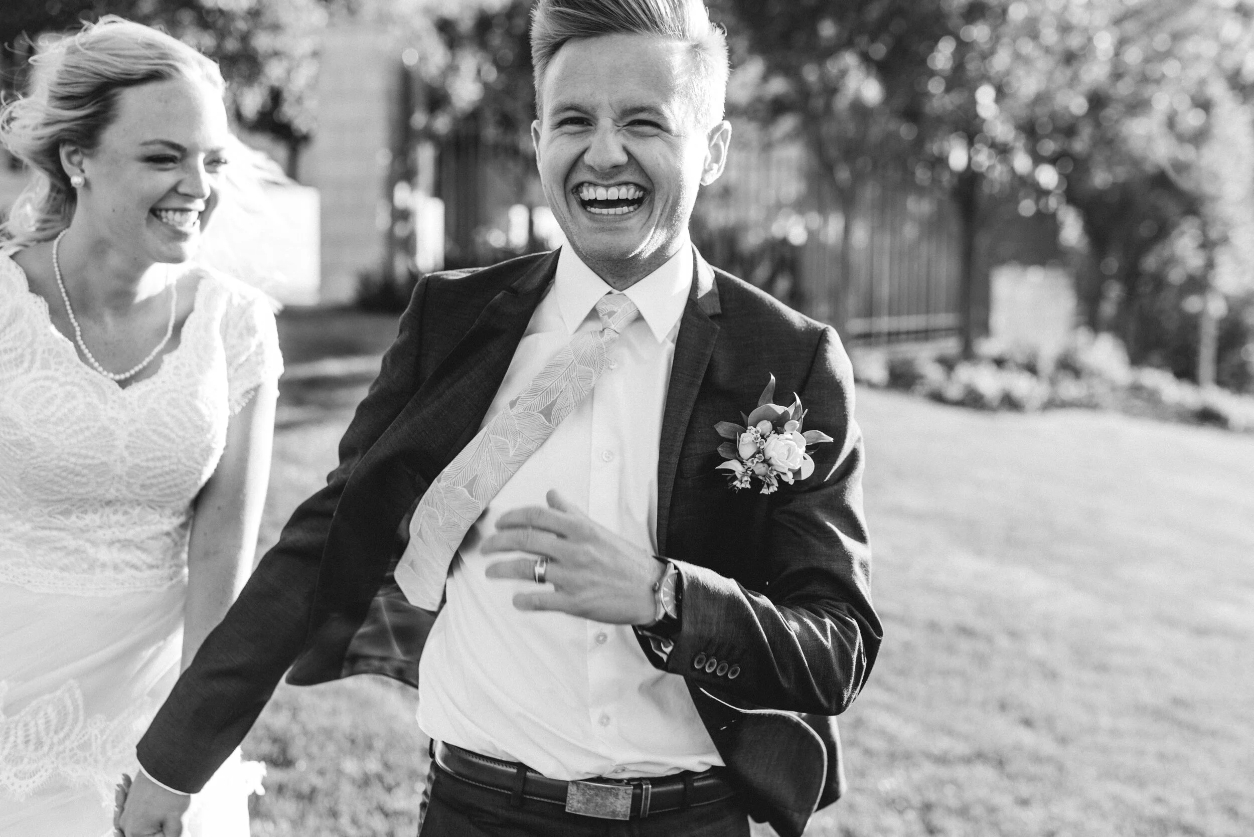 wedding_couple_running_and_laughing.JPG