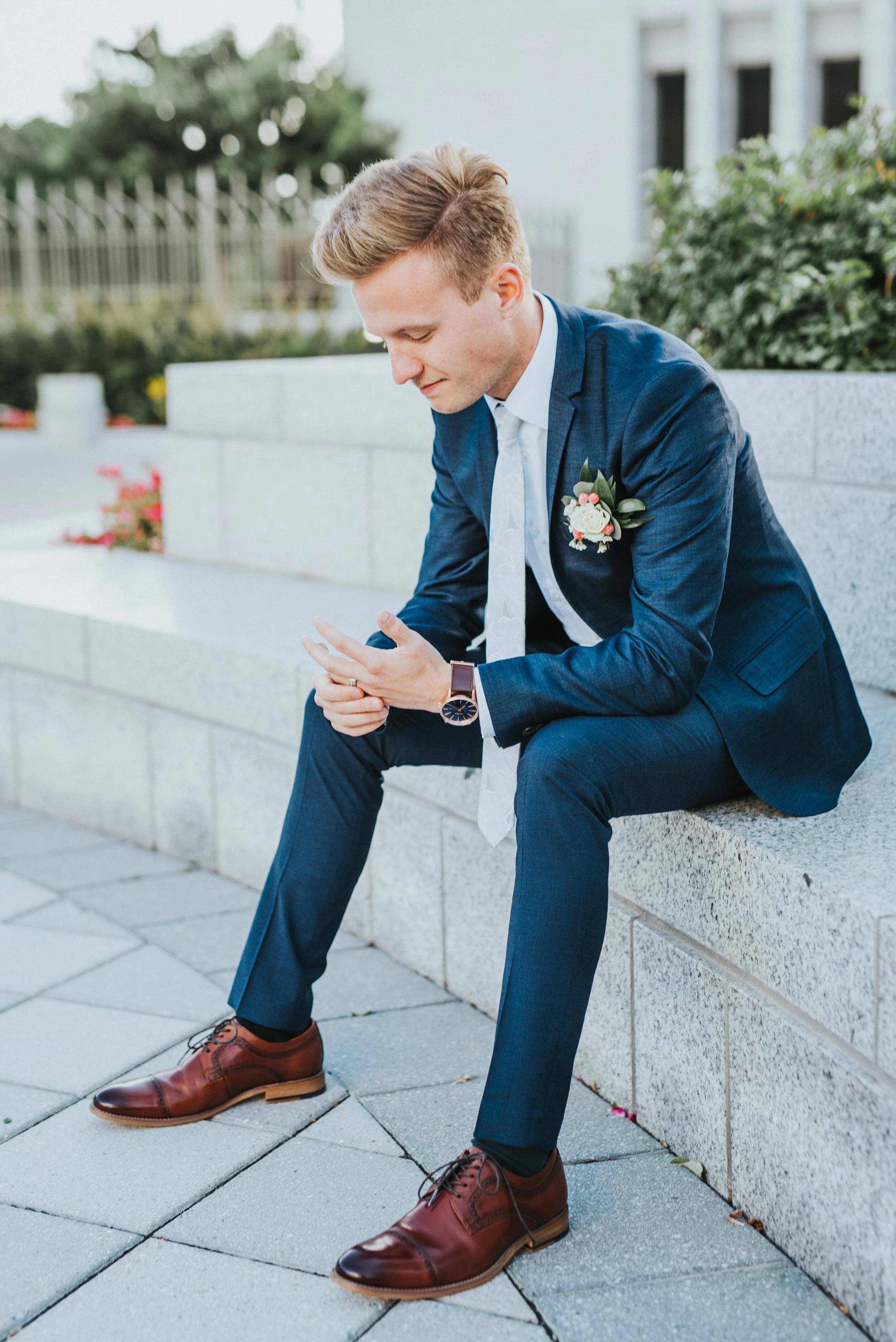 groom_sitting_on_bench.JPG
