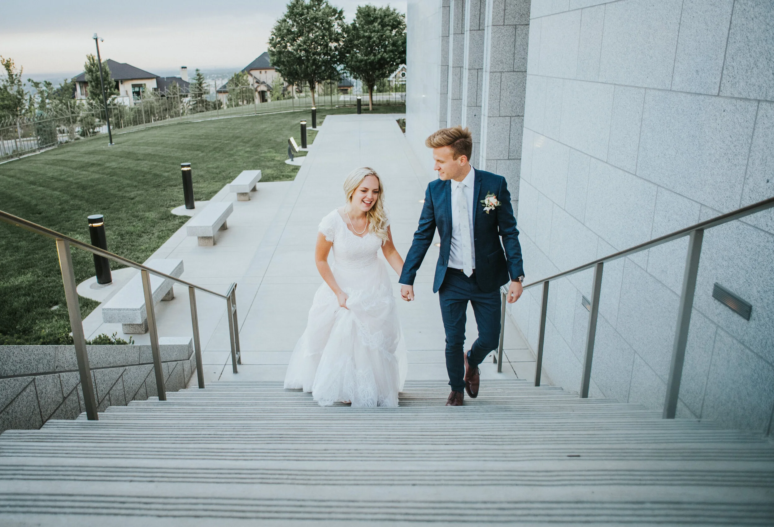 wedding_couple_walking_up_strairs.JPG