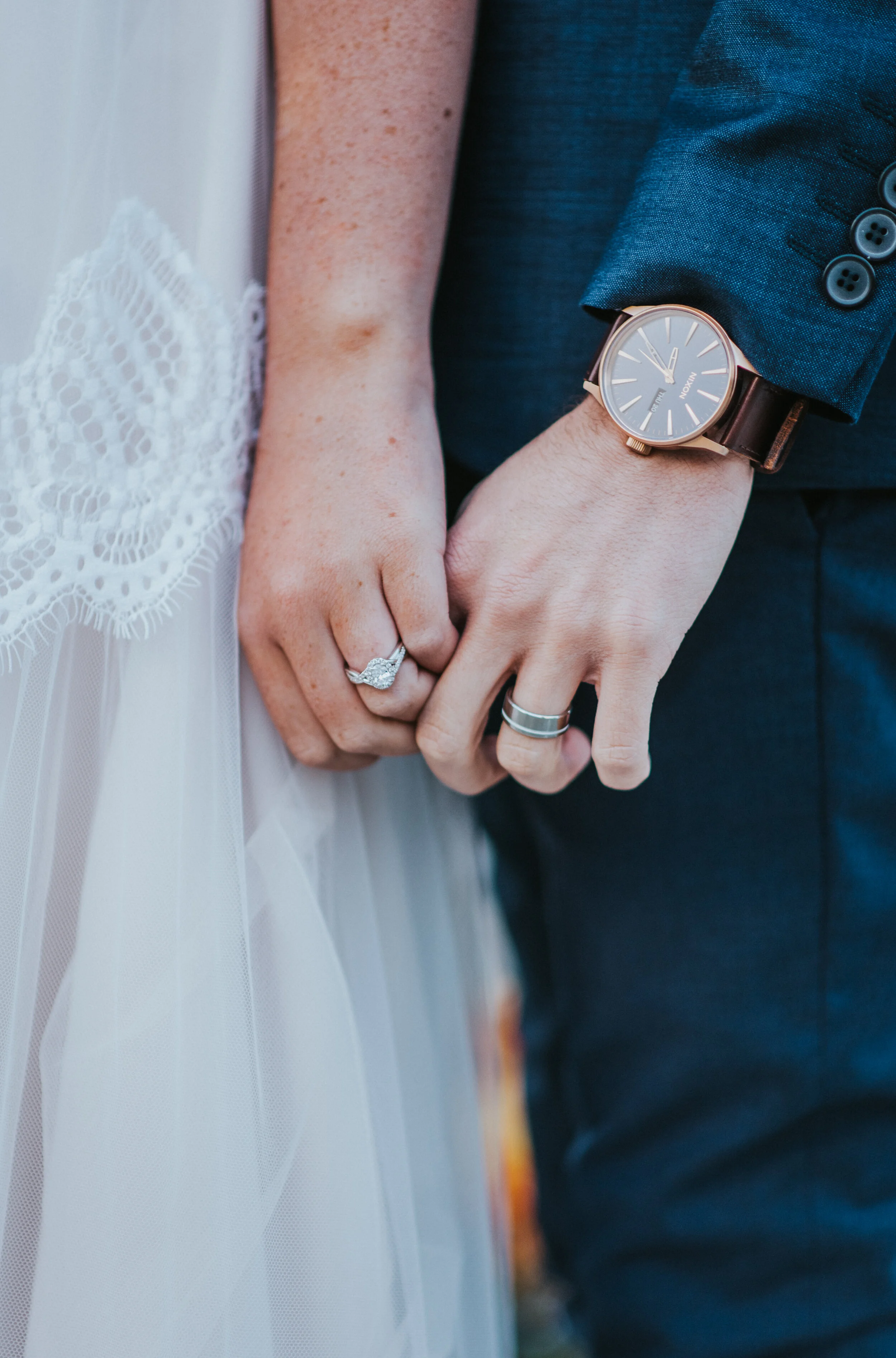 holding_hands_with_wedding_rings.JPG