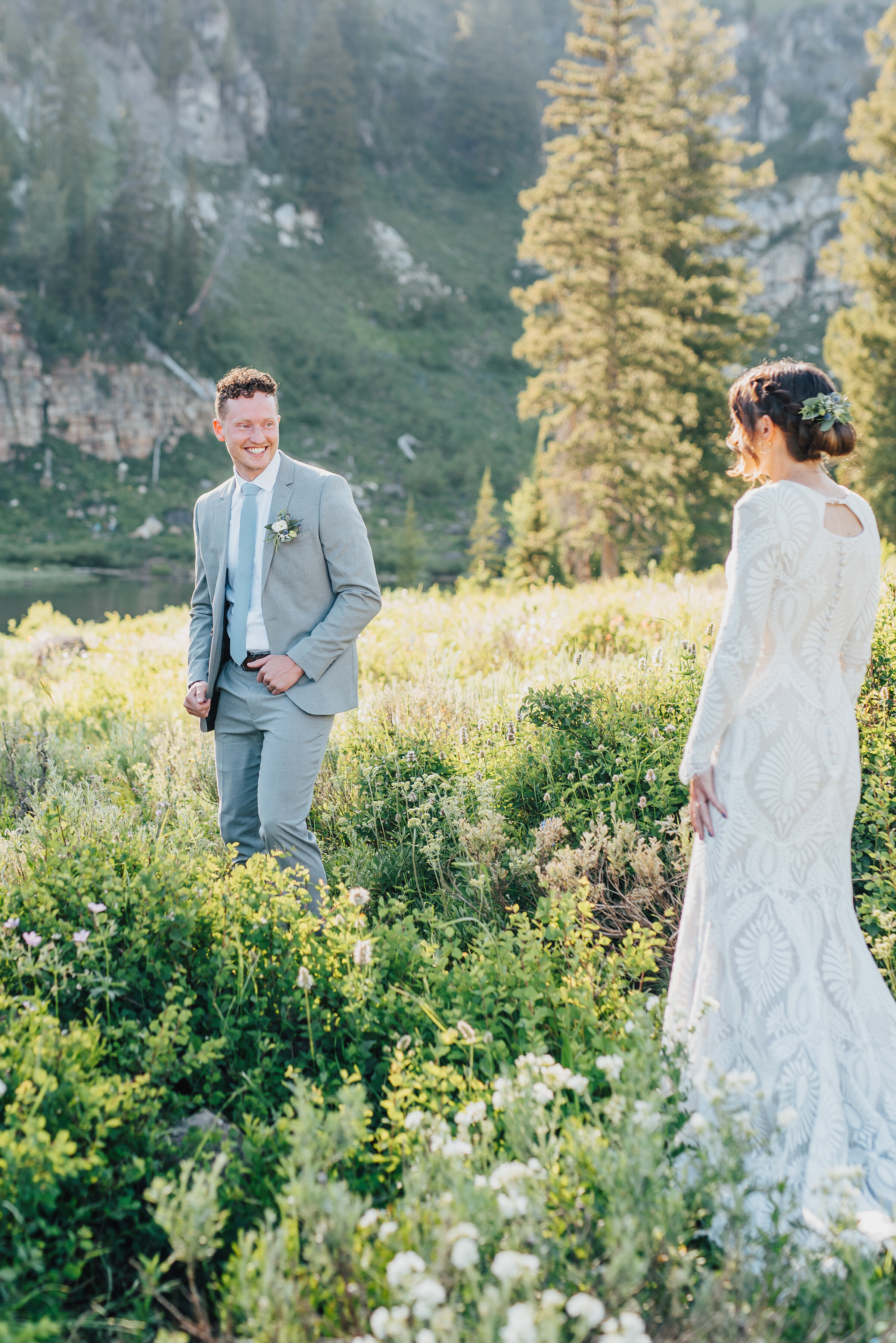  Overjoyed groom at the sight of his bride to be during their first look up Logan canyon at Tony Grove. Kristi Alyse photography Logan Utah wedding photographer forest nature dreamy formals Logan canyon Tony Grove scenic bridals Northern Utah photogr