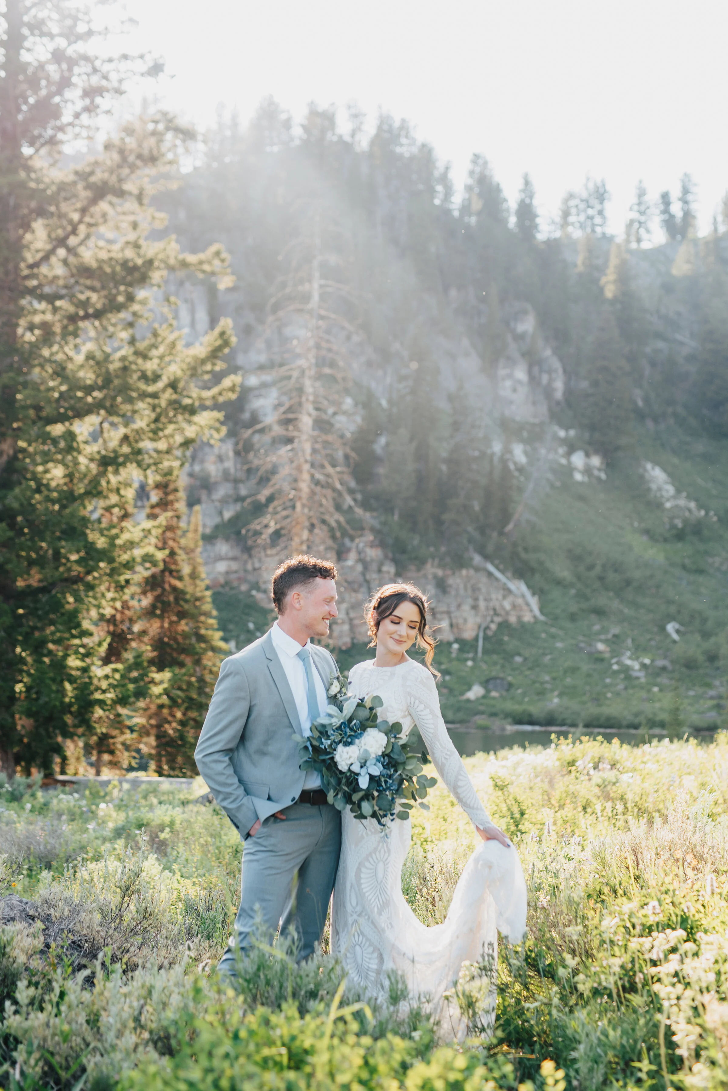  Gorgeous sunlit bride and groom at Tony grove up Logan canyon for their formals. Kristi Alyse photography Logan Utah wedding photographer forest nature dreamy formals Logan canyon Tony Grove scenic bridals Northern Utah photographer Utah brides brid