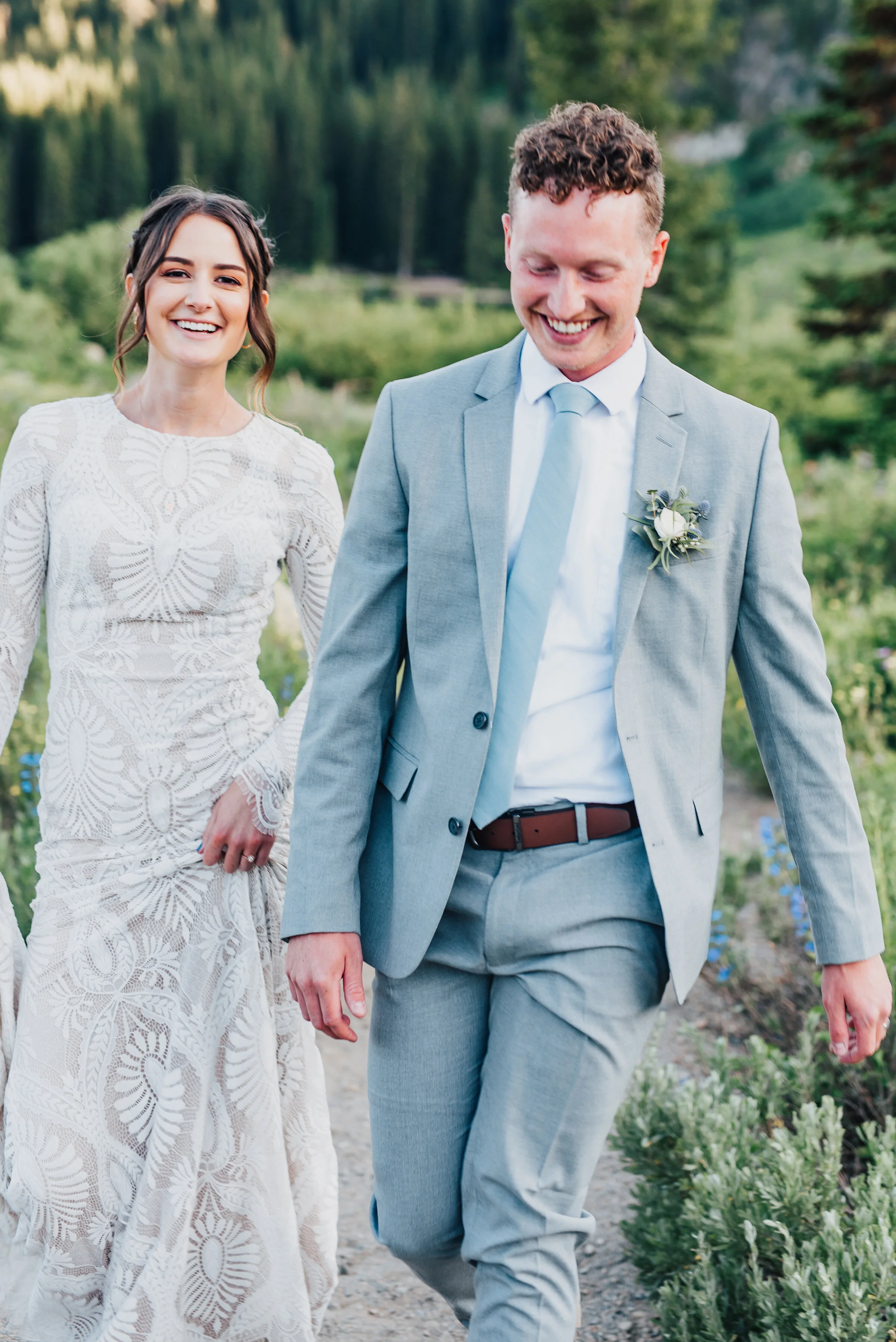  Delighted bride and groom during their formals up Logan canyon at Tony Grove. Kristi Alyse photography Logan Utah wedding photographer forest nature dreamy formals Logan canyon Tony Grove scenic bridals Northern Utah photographer Utah brides bride a