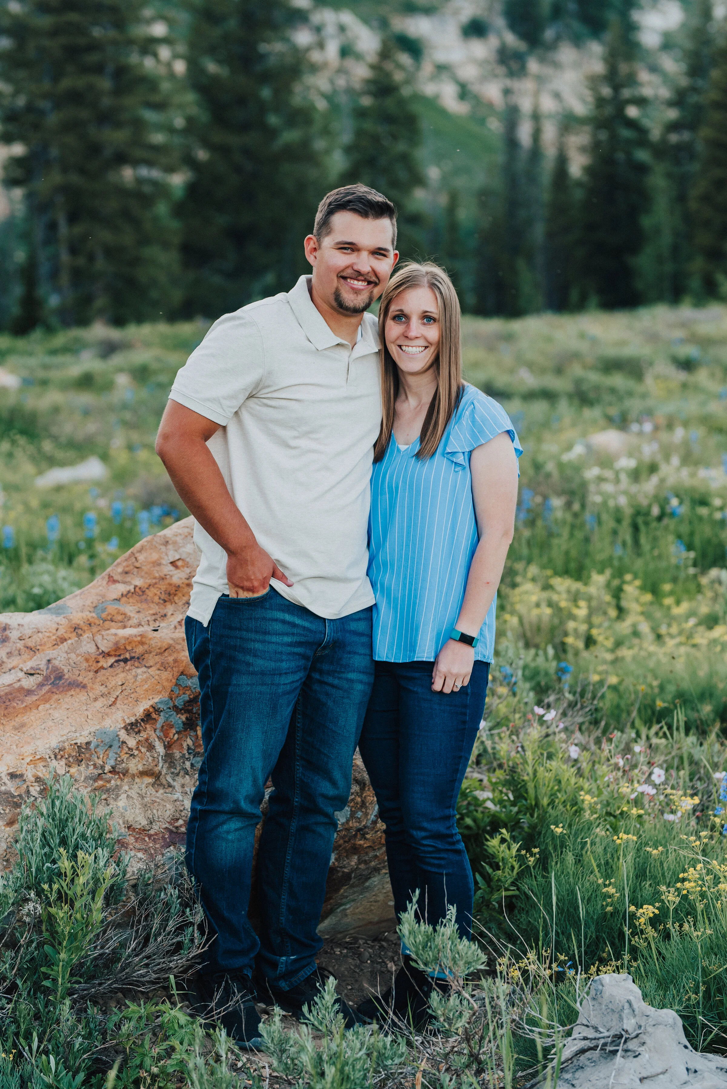  Beautiful couple in this dreamy meadow during a family photo session up Logan Canyon. Logan Utah family photographer Kristi Alyse photography Tony Grove forest nature photos Logan canyon light blue family photos wild flowers grand parents children p
